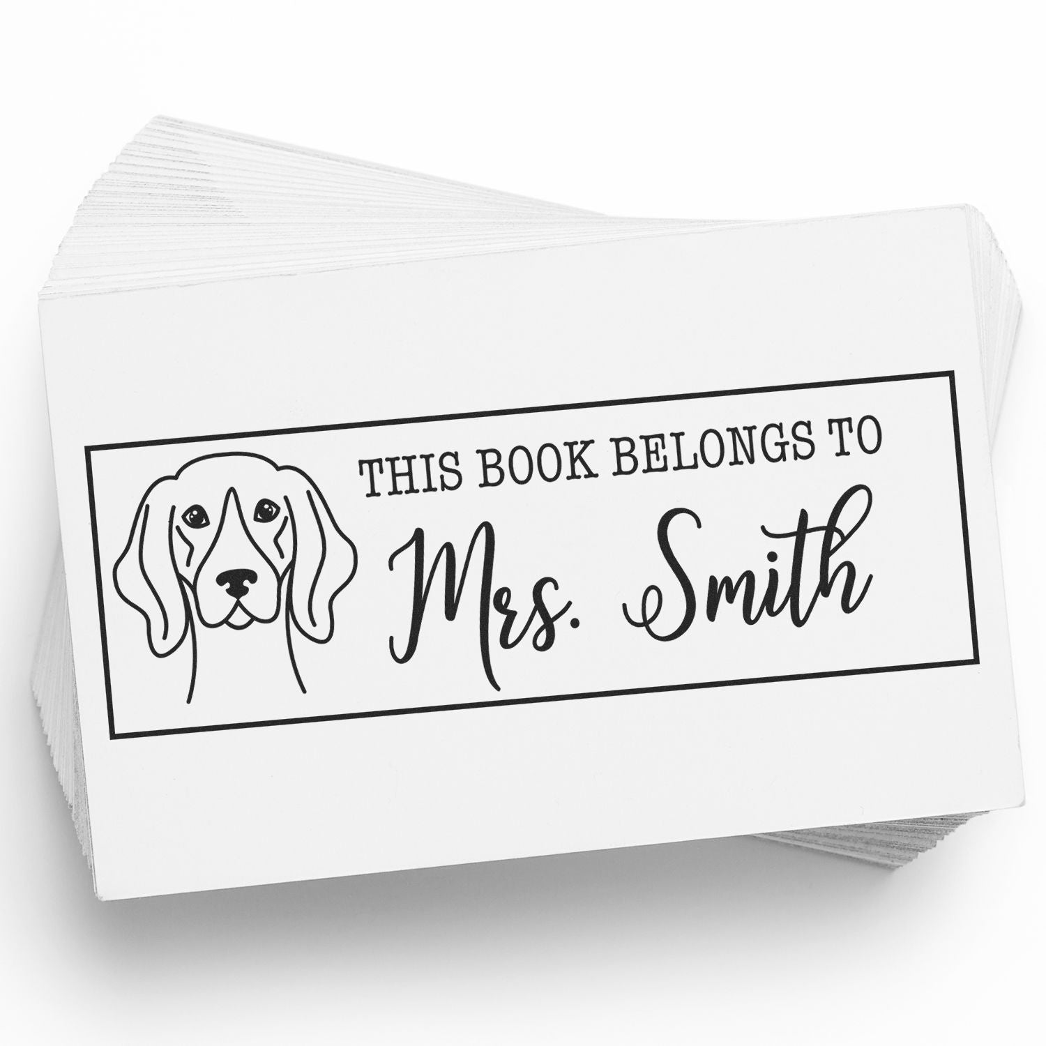 Personalized dog book stamp reading This Book Belongs to Mrs. Smith for custom library bookplate marking.