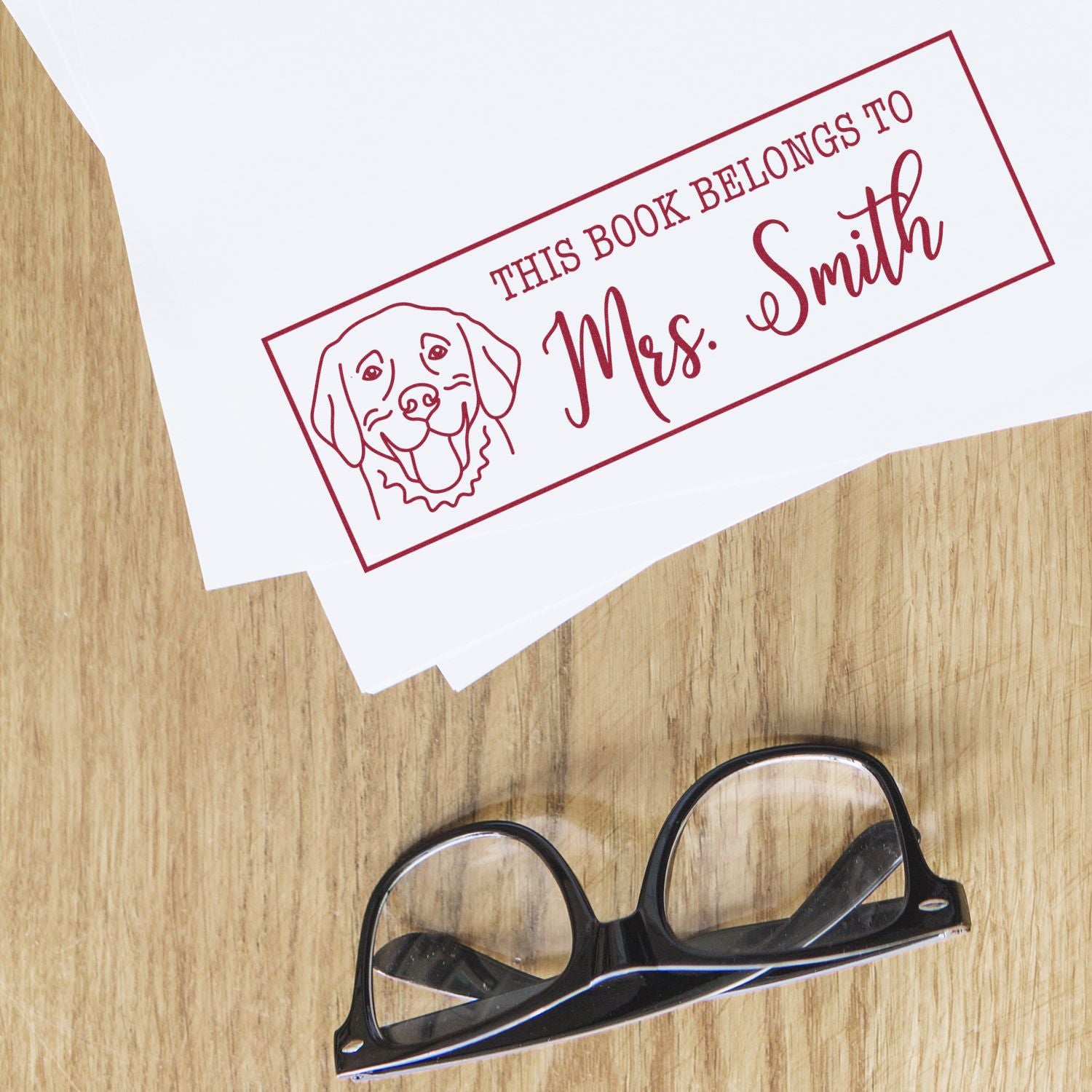 Custom book stamp for Mrs. Smith with dog design, perfect personalized rubber stamp for book labels and library collections.