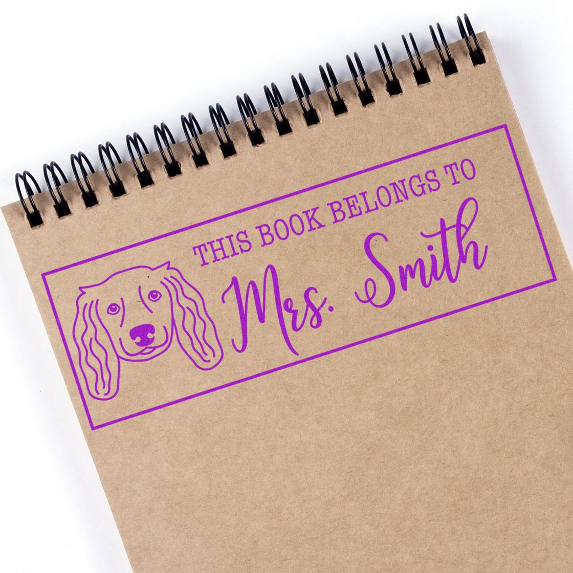 Custom personalized rubber book stamp for Mrs. Smith with dog design, ideal for labeling books and library collections.