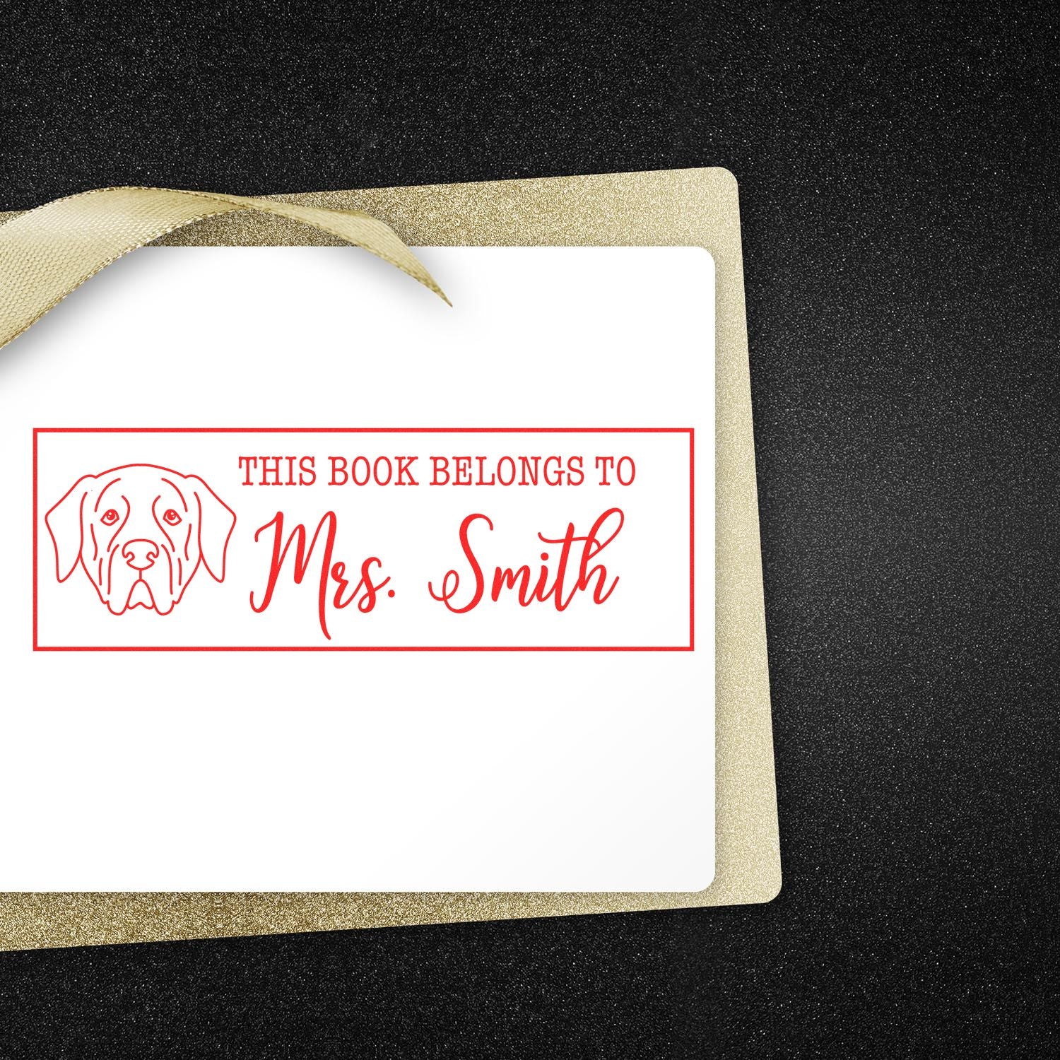 Personalized dog bookplate rubber stamp reading This Book Belongs to Mrs. Smith for custom book labeling.