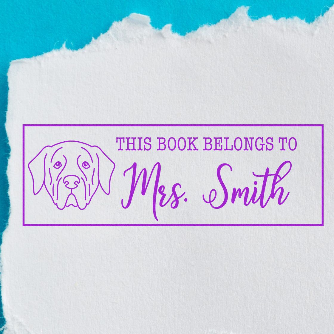 Custom dog book stamp reading This Book Belongs to Mrs. Smith in purple ink, ideal for personalizing library books.