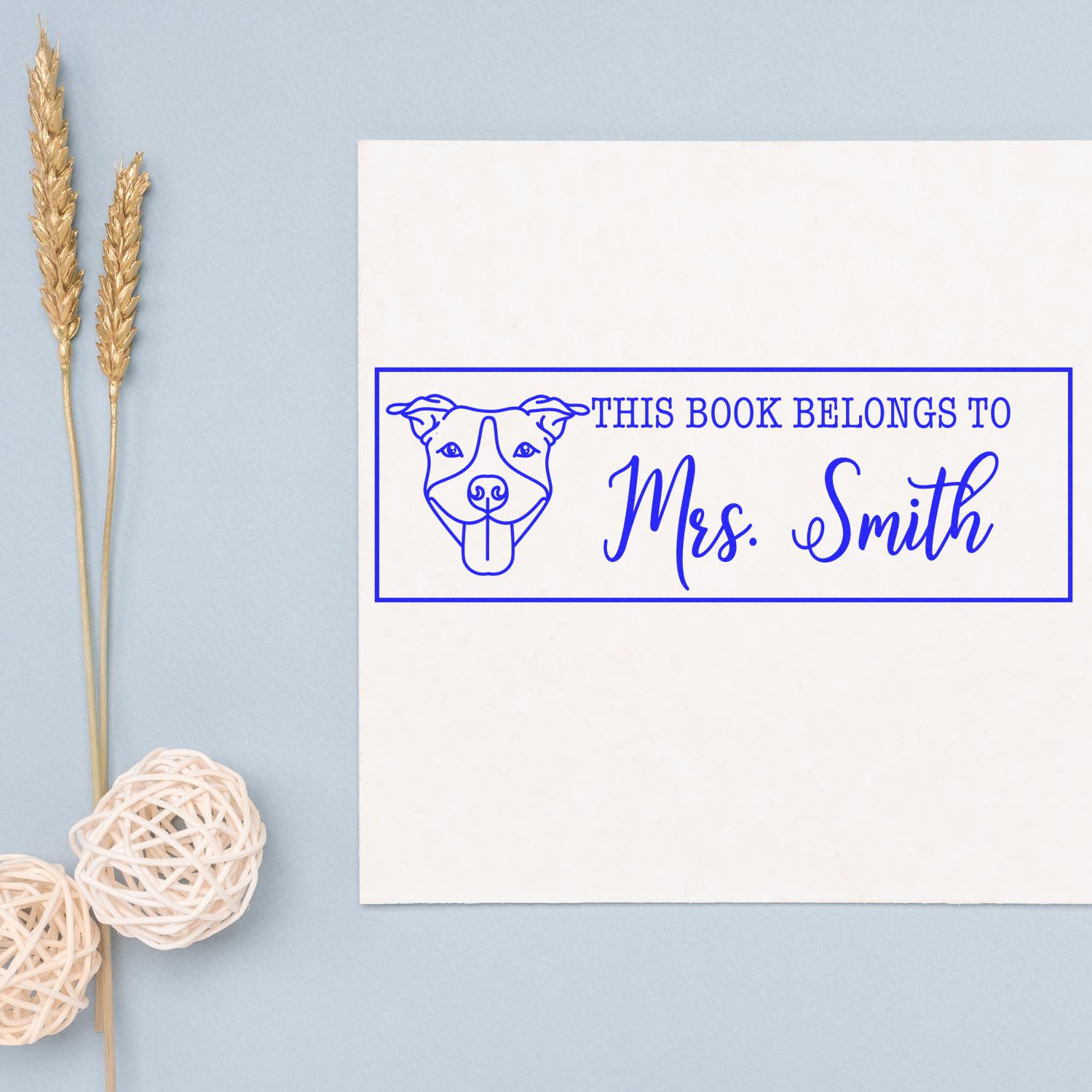 Custom rubber stamp bookplate for Mrs. Smith with dog illustration, perfect for personalizing books and gifts.
