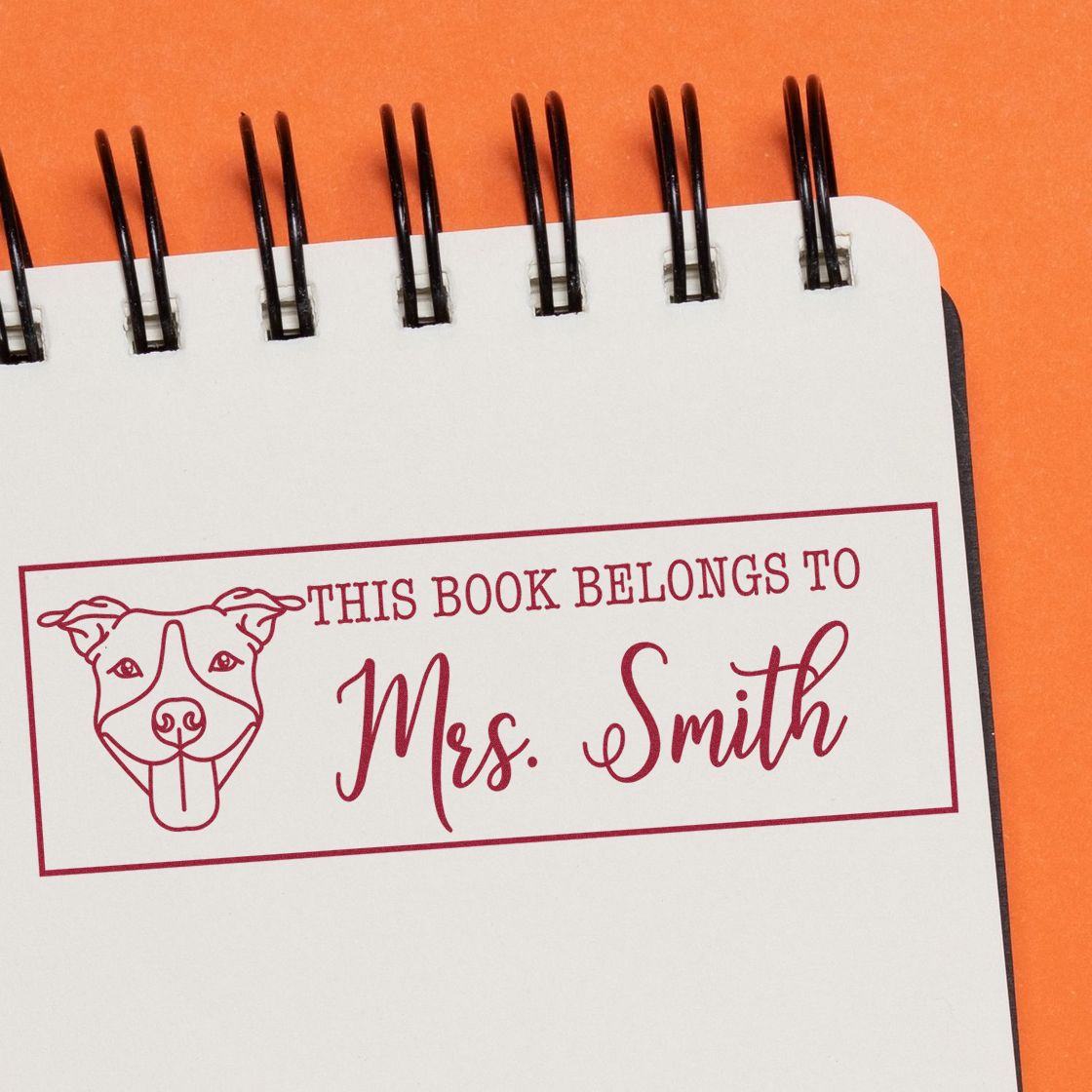 Custom dog book stamp reading This Book Belongs to Mrs. Smith for personalized teacher and library rubber stamps