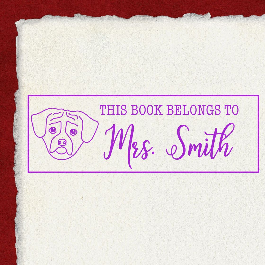Custom rubber stamp for books with dog illustration and This Book Belongs to Mrs. Smith personalized ex libris design.