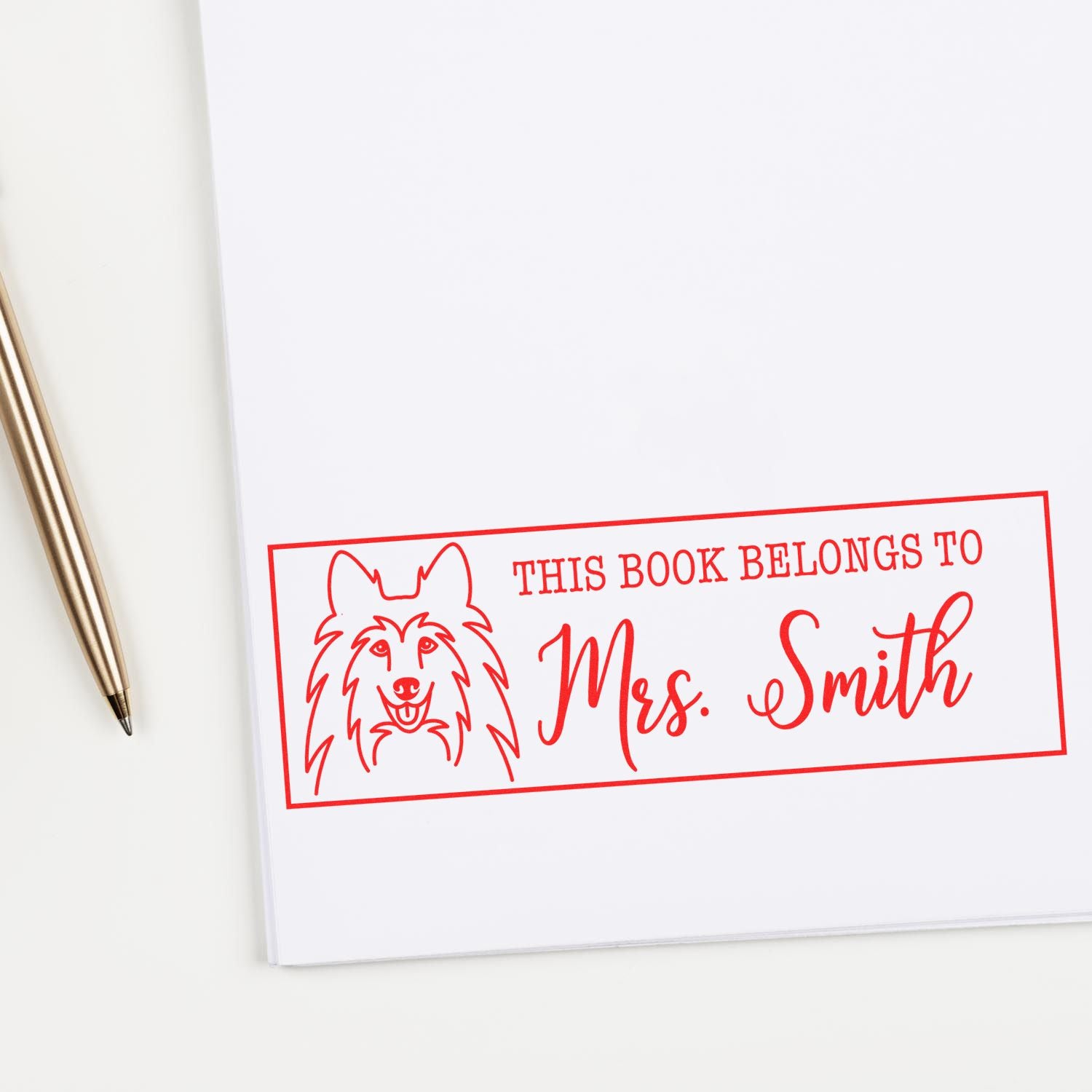 Dog-themed custom rubber stamp reading This Book Belongs to Mrs. Smith for personalized book labels and classroom libraries.
