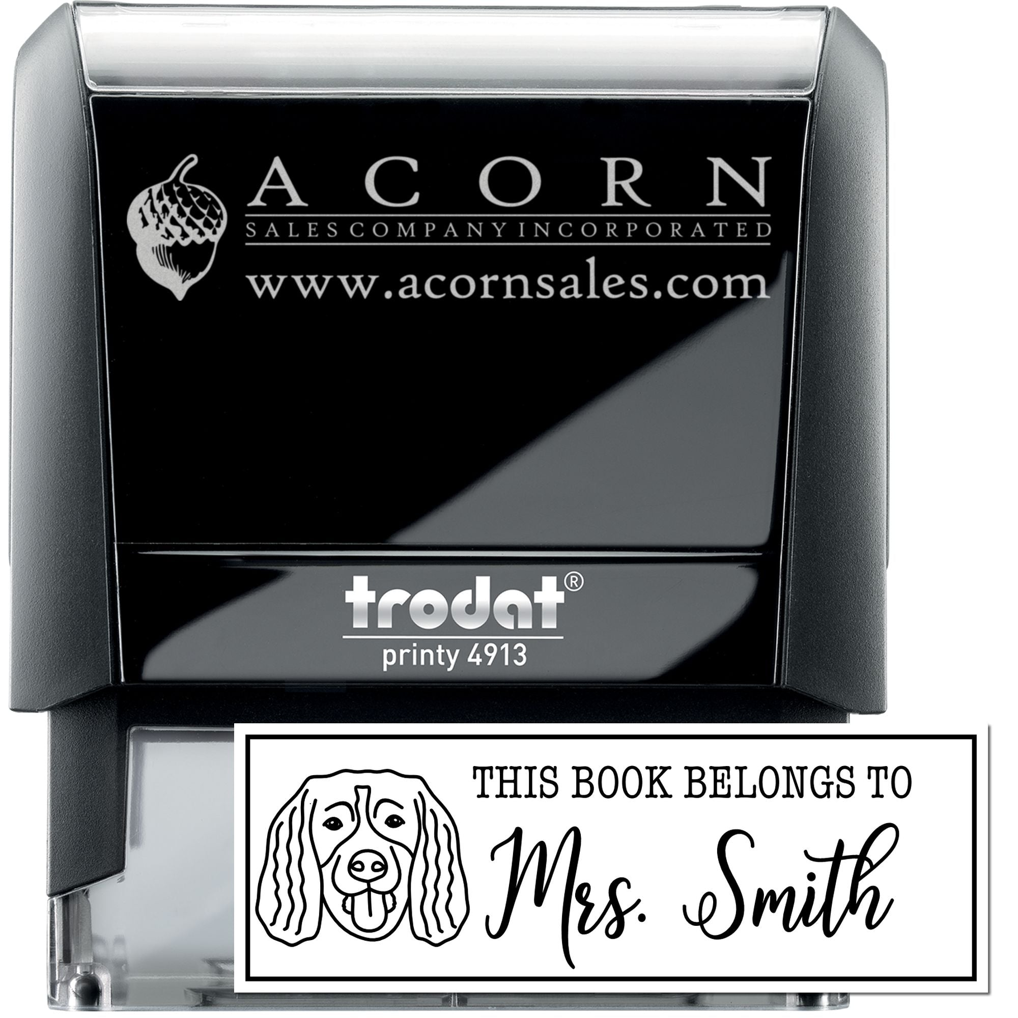 Trodat self-inking rubber stamp with custom Acorn Sales logo and personalized This Book Belongs To Mrs. Smith book stamp design