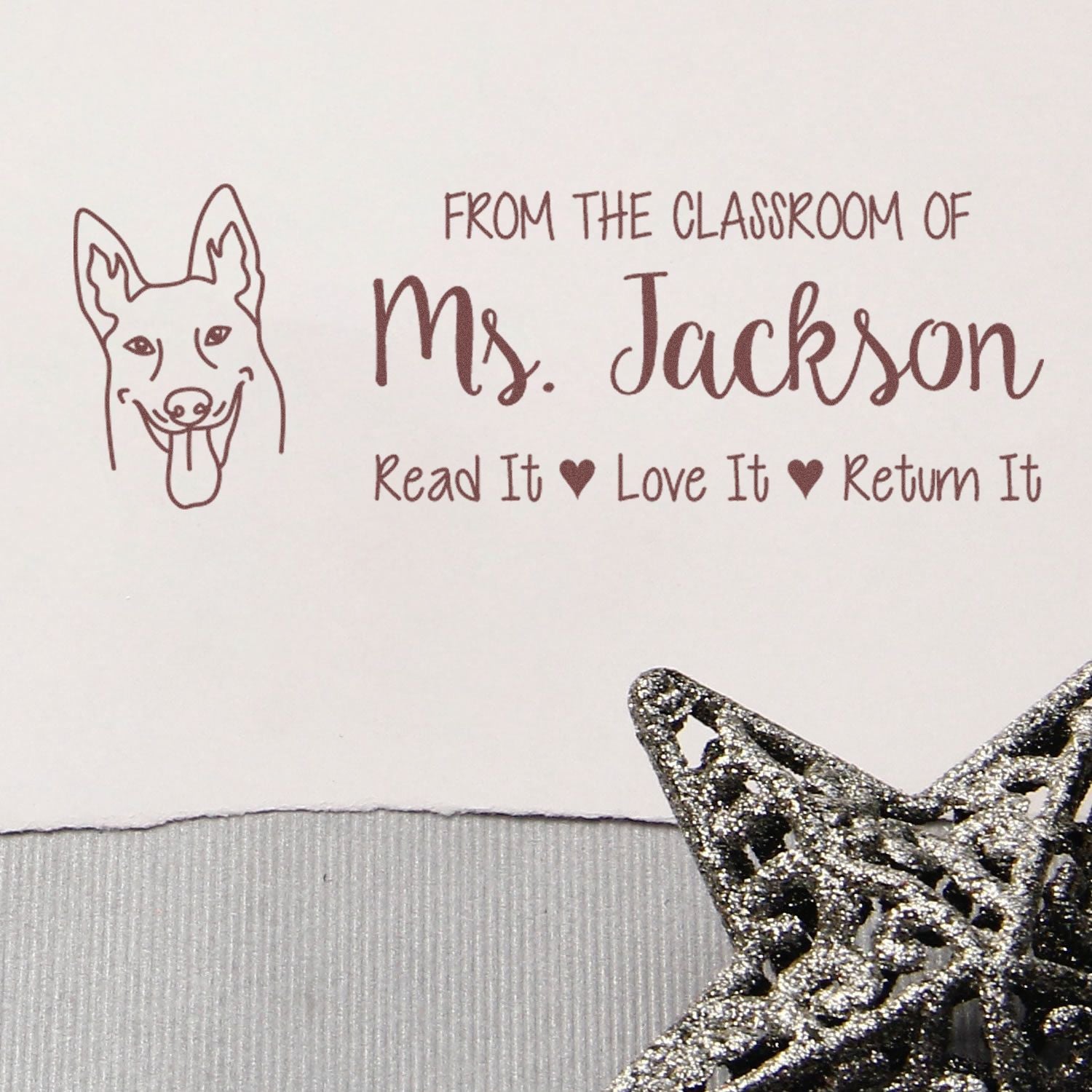 Custom teacher book stamp with dog design, From the Classroom of Ms. Jackson, Read It Love It Return It rubber stamp.