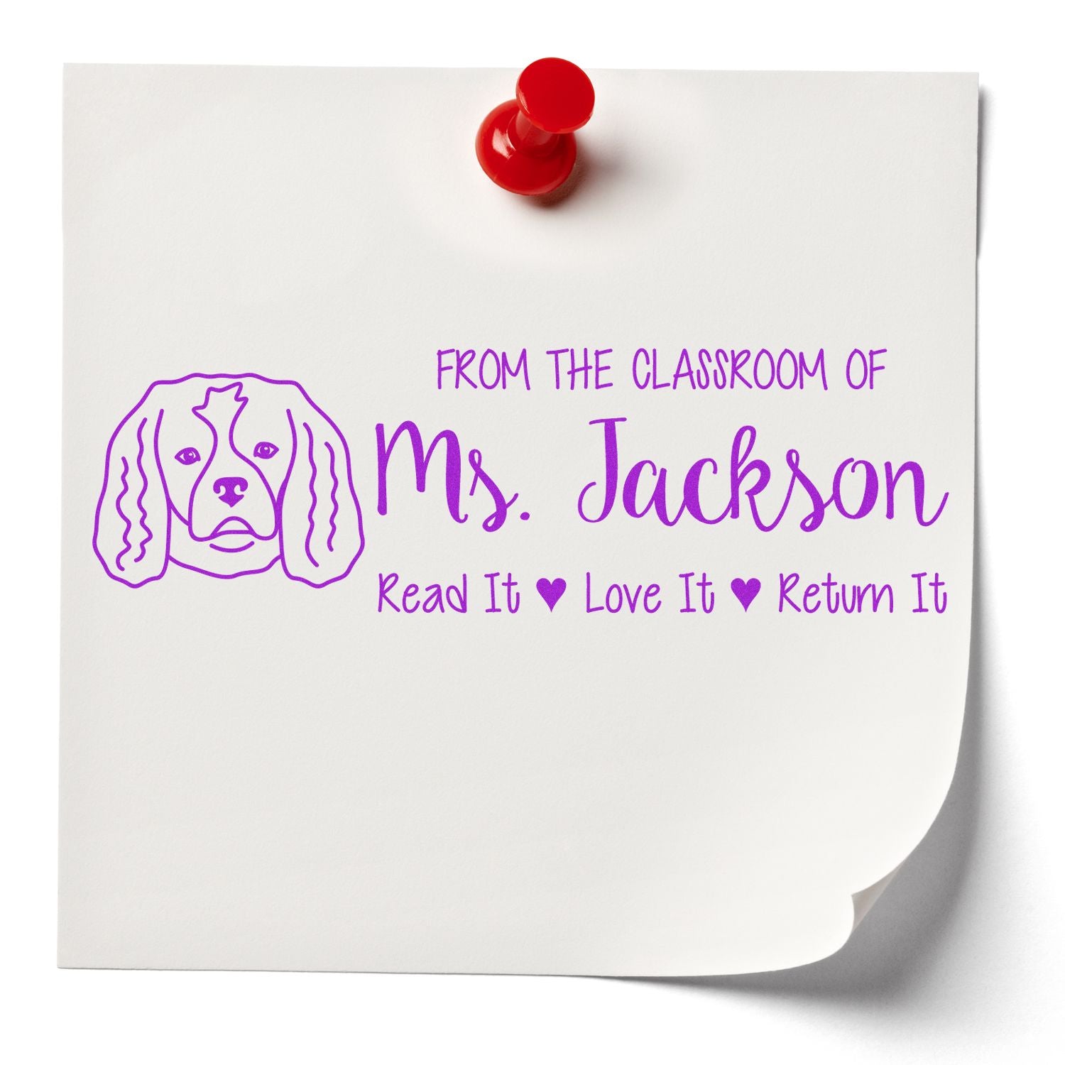 Custom classroom rubber stamp with dog illustration, Ms. Jackson name, and Read It, Love It, Return It library message.