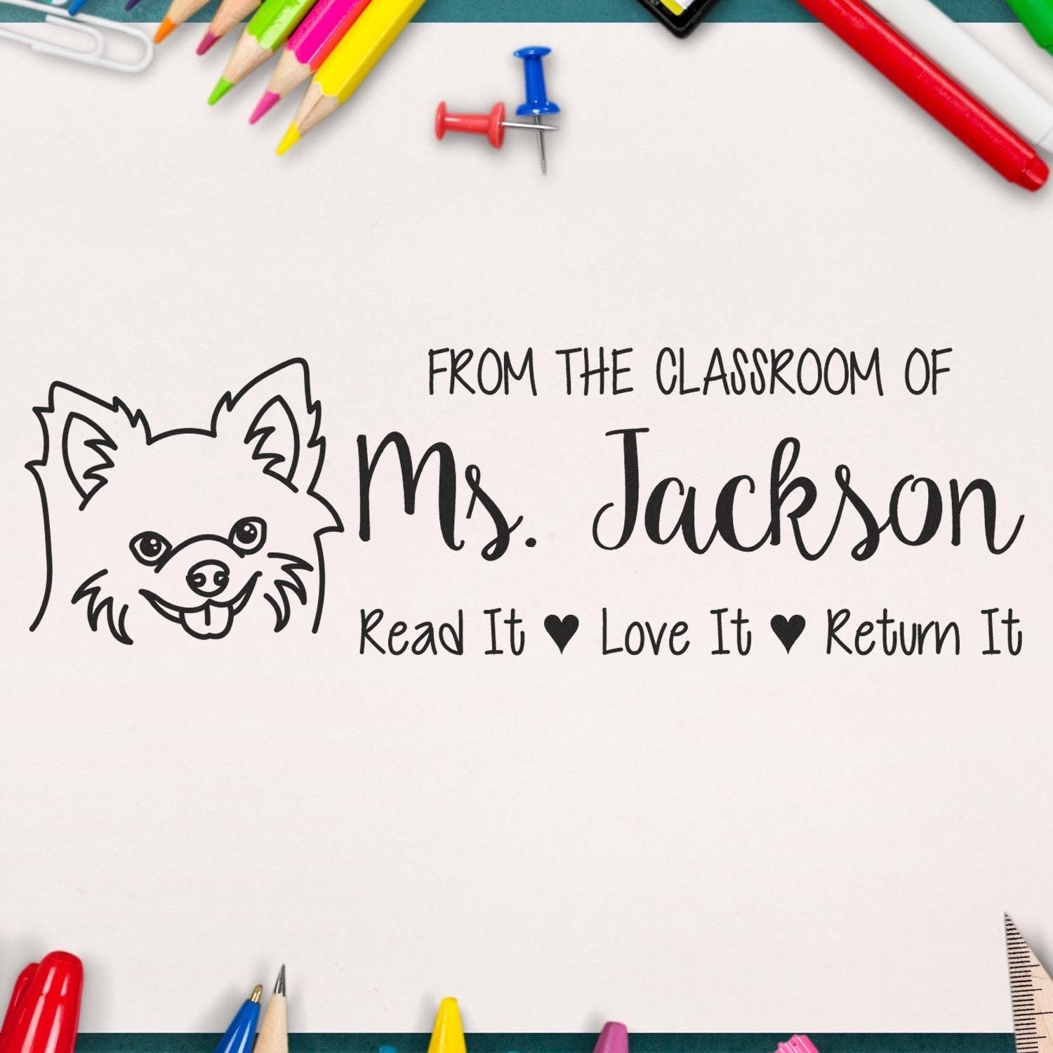 Custom classroom rubber stamp for teachers: Read It, Love It, Return It with Ms. Jackson name and dog design for book labeling.