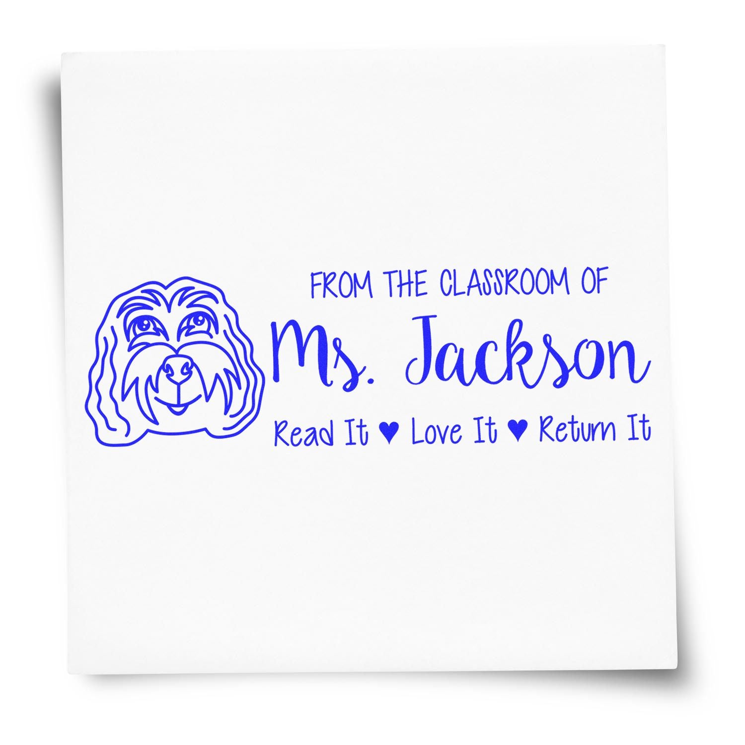 Personalized teacher rubber stamp with dog icon and From the classroom of Ms. Jackson book return message for classroom books.