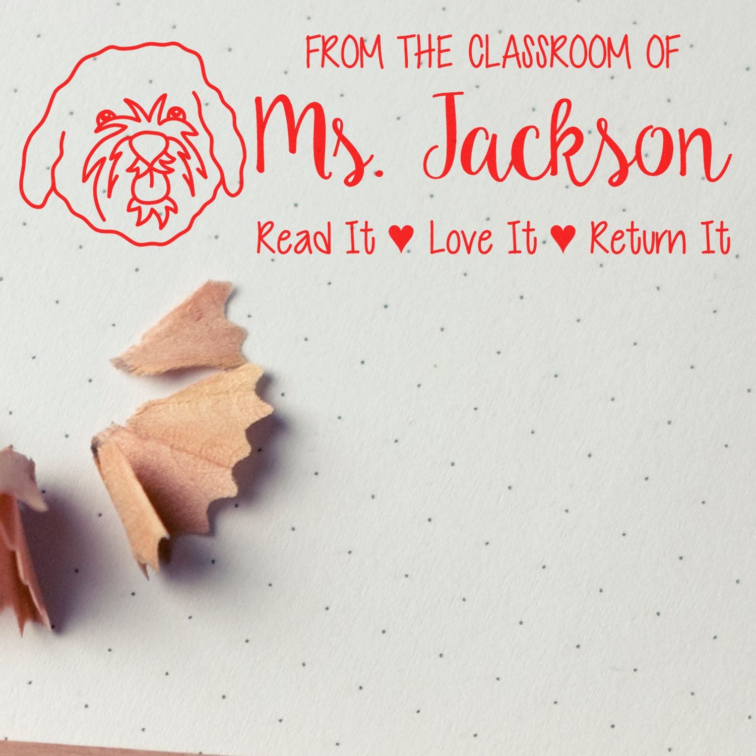 Personalized teacher book stamp with dog icon and return message: From the classroom of Ms. Jackson, Read it, Love it, Return it.