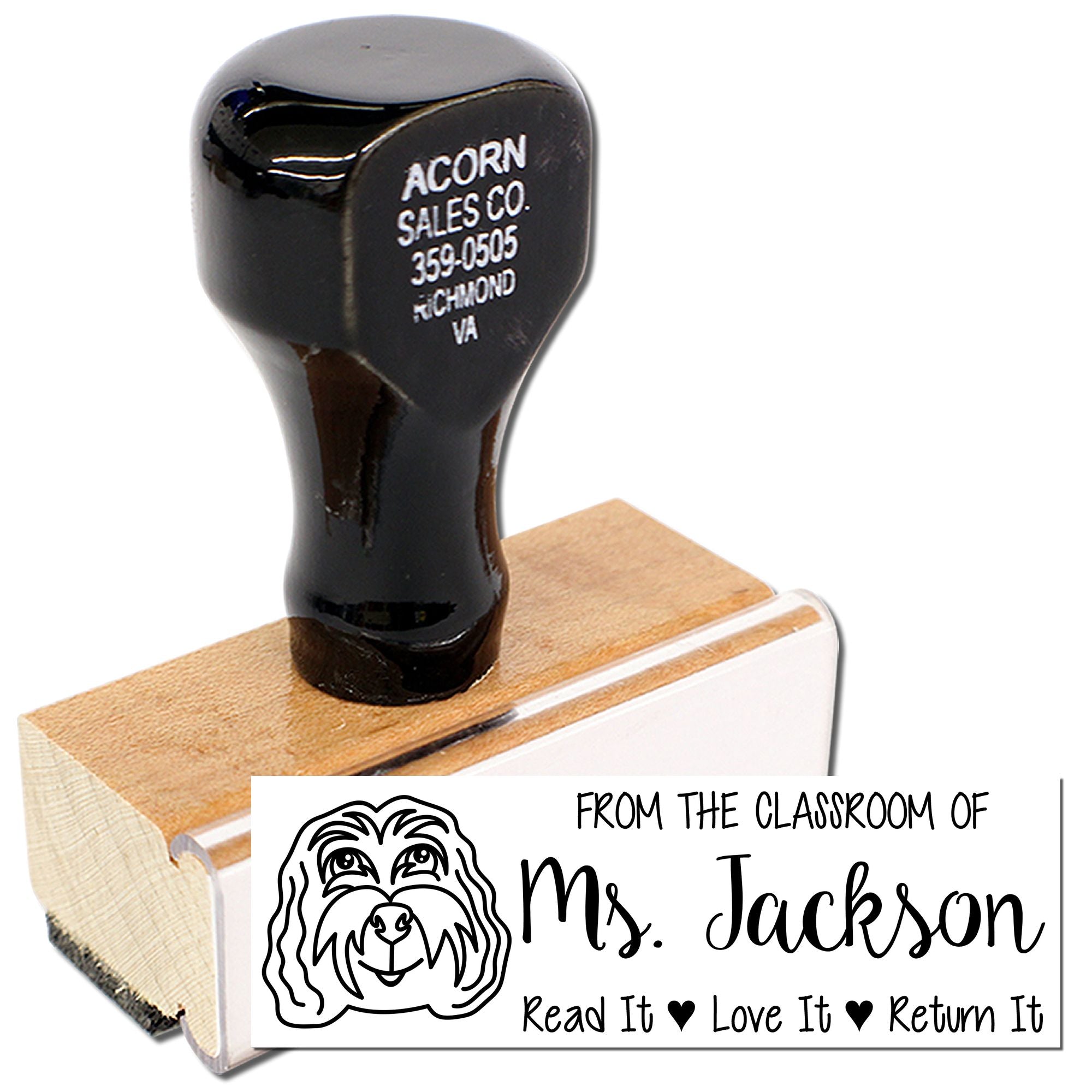 Personalized teacher rubber stamp with dog logo and From the Classroom of Ms. Jackson read-it-love-it-return-it message.