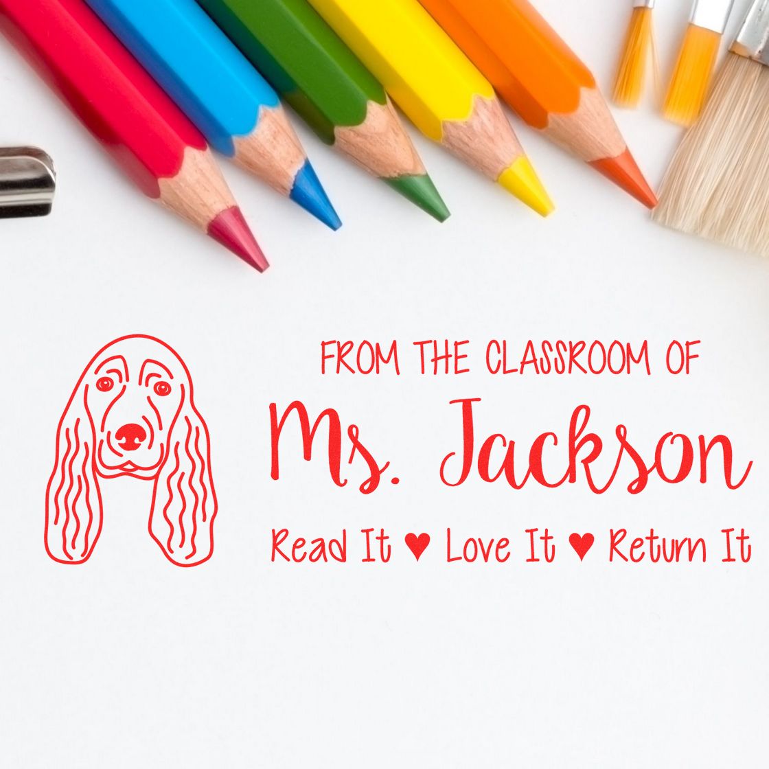 Personalized classroom rubber stamp for Ms. Jackson with dog graphic and Read It, Love It, Return It message.