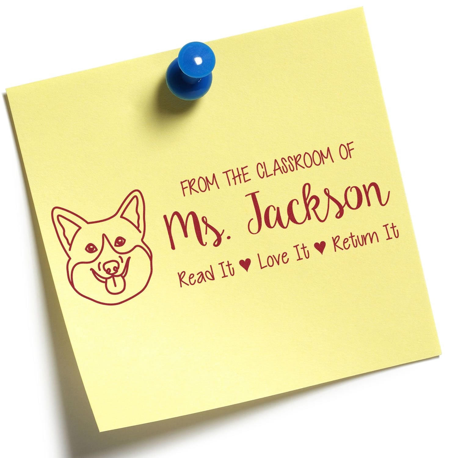Custom classroom rubber stamp with dog icon and teacher name, reading From the classroom of Ms. JacksonRead it, Love it, Return It.