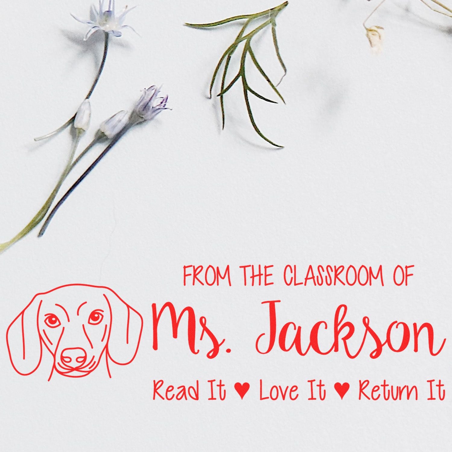 Custom classroom rubber stamp with dog logo, from the classroom of Ms. Jackson, read it, love it, return it.