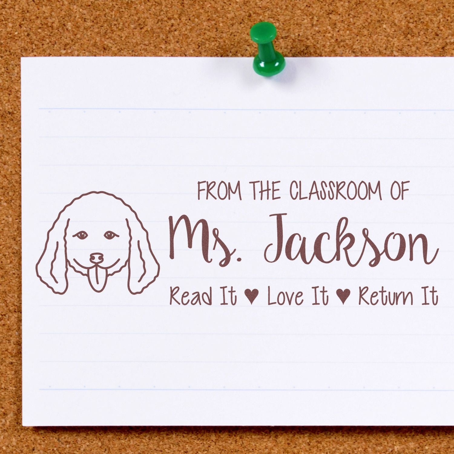 Custom classroom rubber stamp for Ms. Jackson with dog icon and Read It, Love It, Return It message for books and papers.