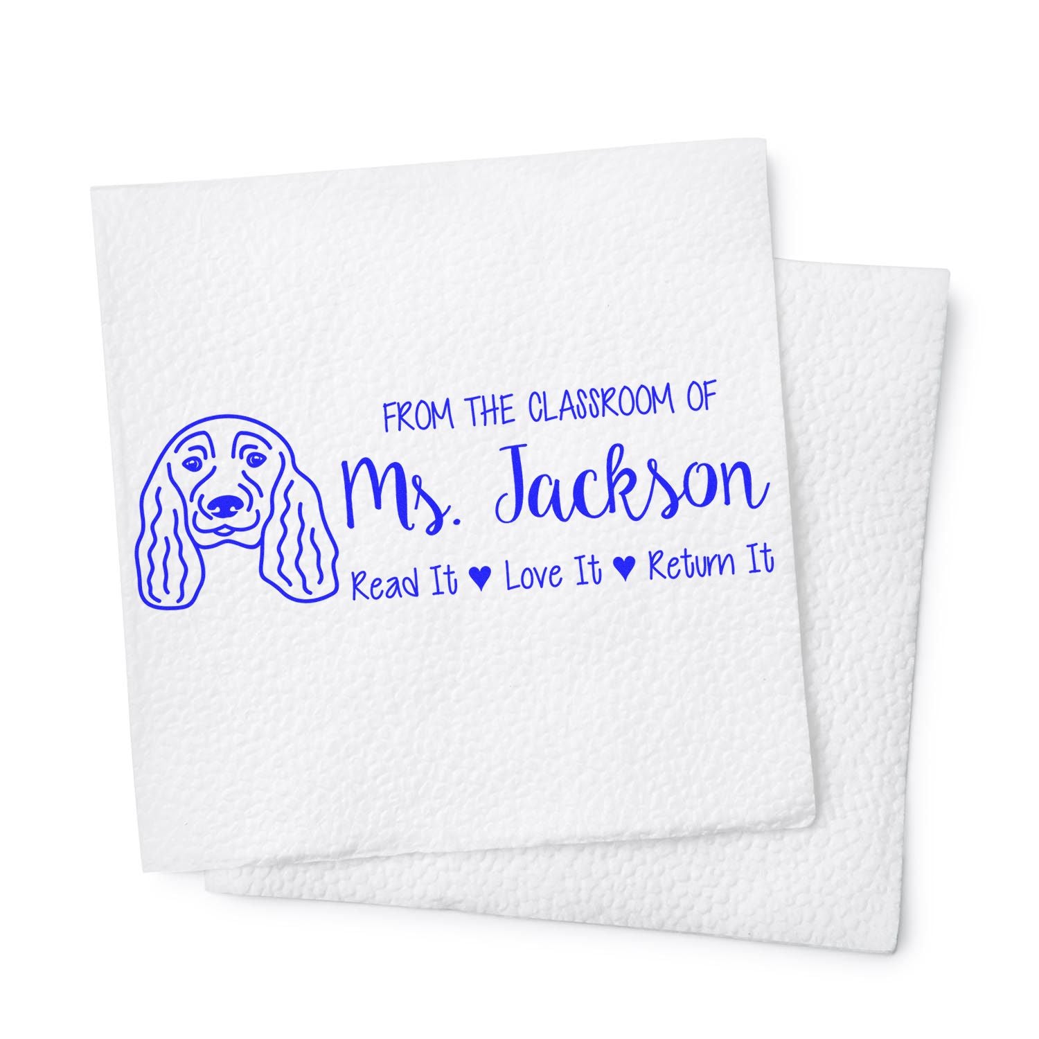 Personalized teacher rubber stamp with dog illustration and Read It Love It Return It message for Ms. Jacksons classroom.