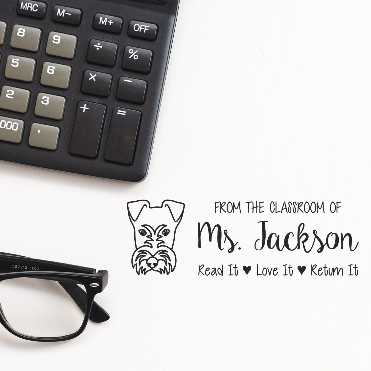 Custom classroom rubber stamp for teachers, featuring dog icon and Read It, Love It, Return It book label for Ms. Jackson.
