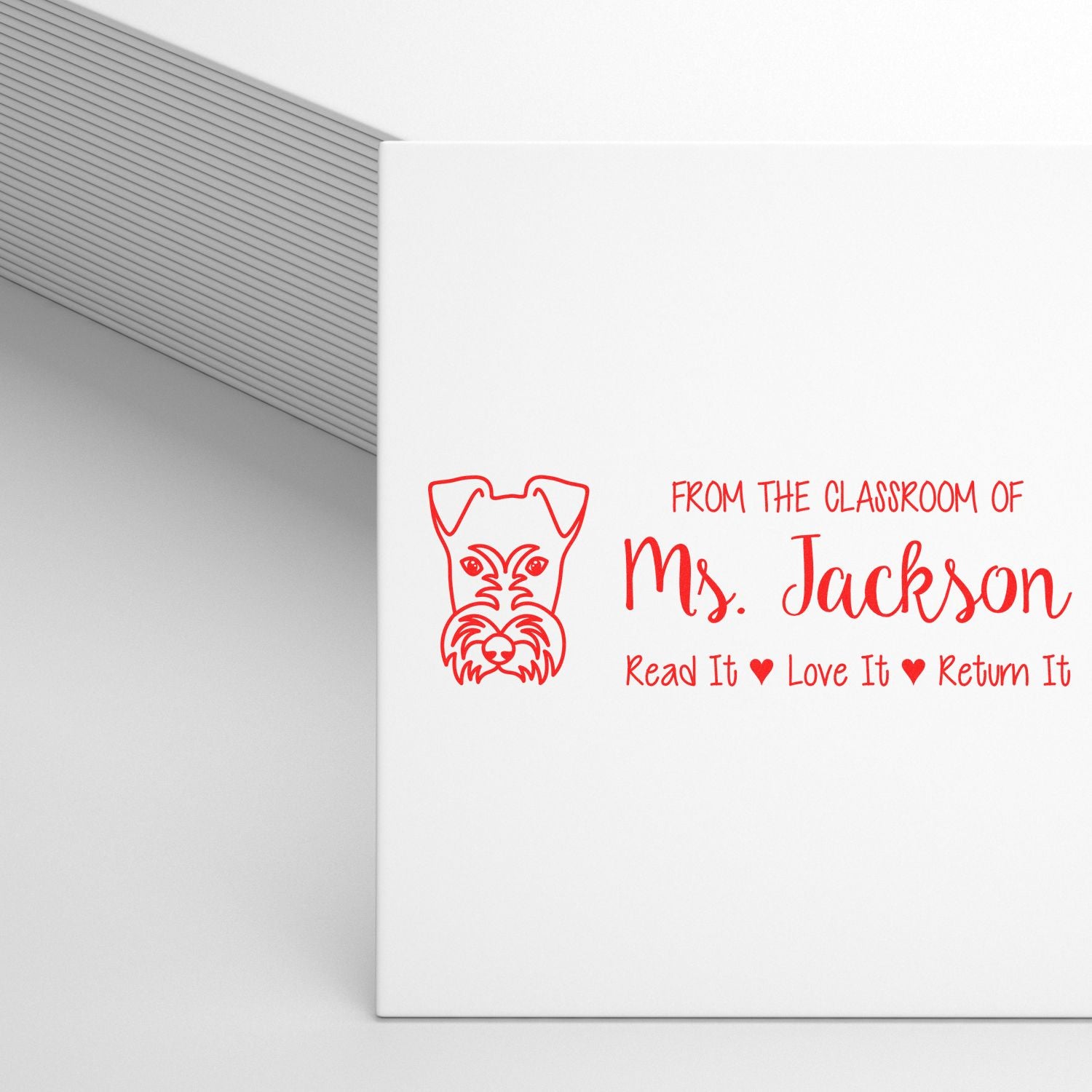 Custom teacher rubber stamp for classroom books: From the Classroom of Mrs. Jackson, Read It, Love It, Return It with dog graphic.