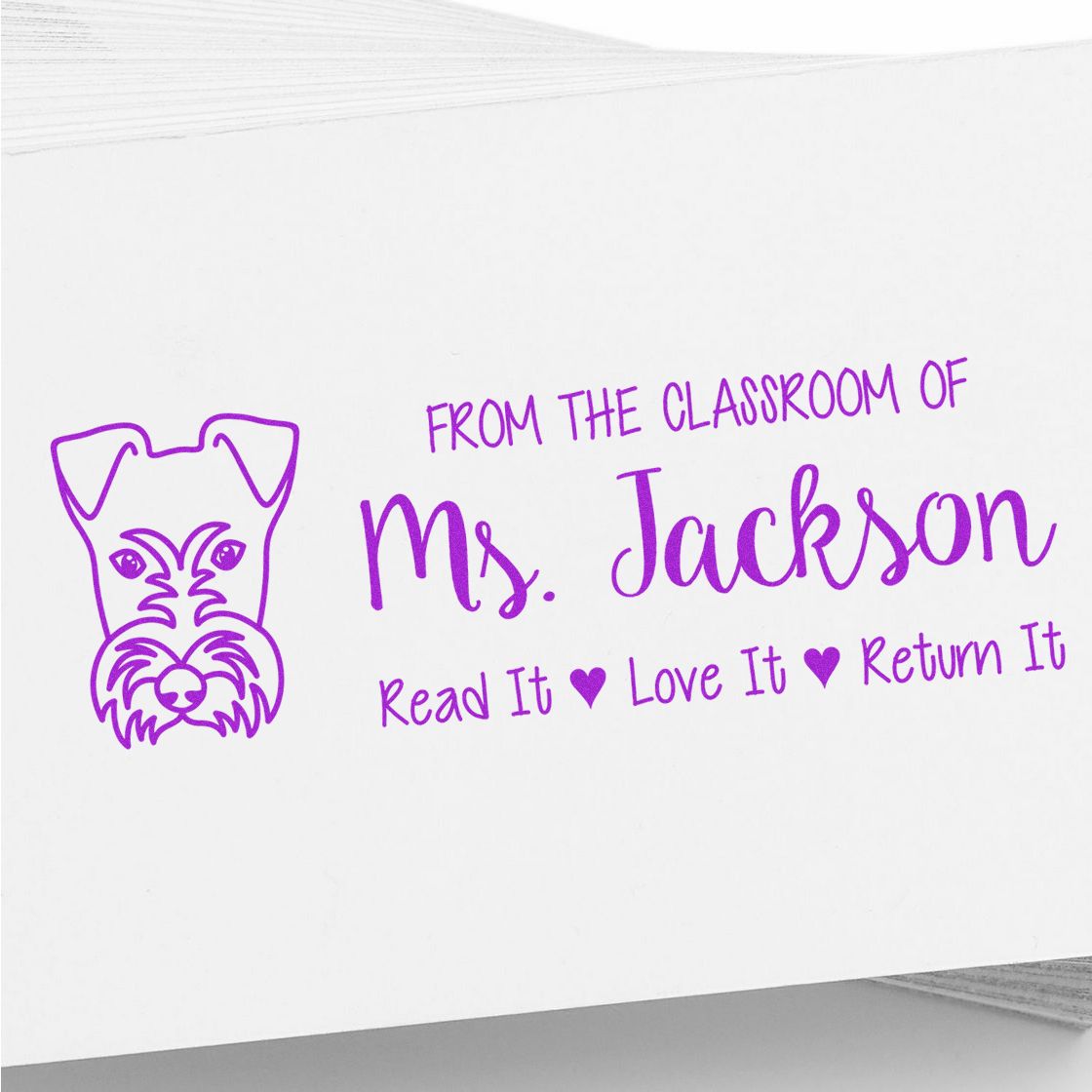 Custom teacher rubber stamp with dog logo and From the classroom of Ms. JacksonRead it, love it, return it book label.
