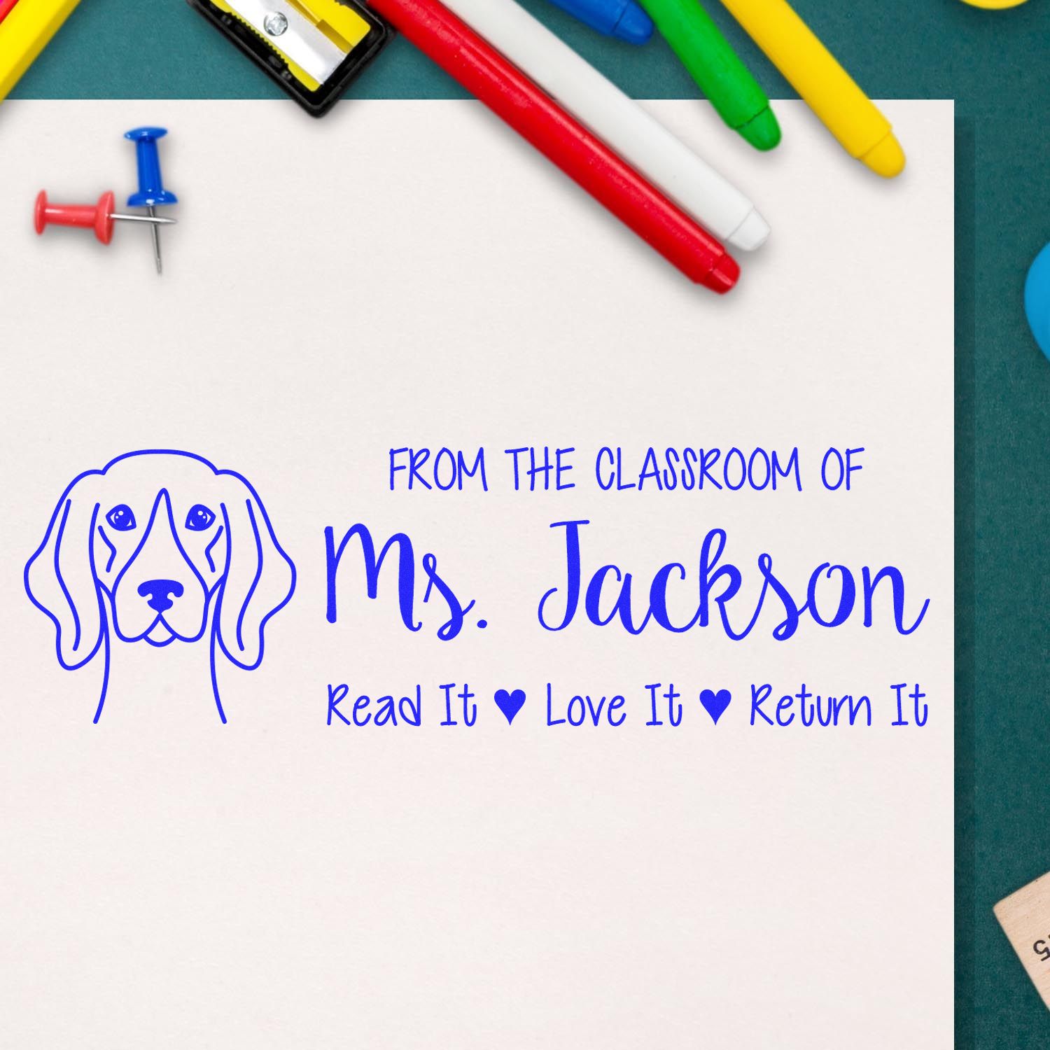 Personalized teacher rubber stamp with dog design and classroom message: Mrs. Jackson, Read it, Love it, Return it.