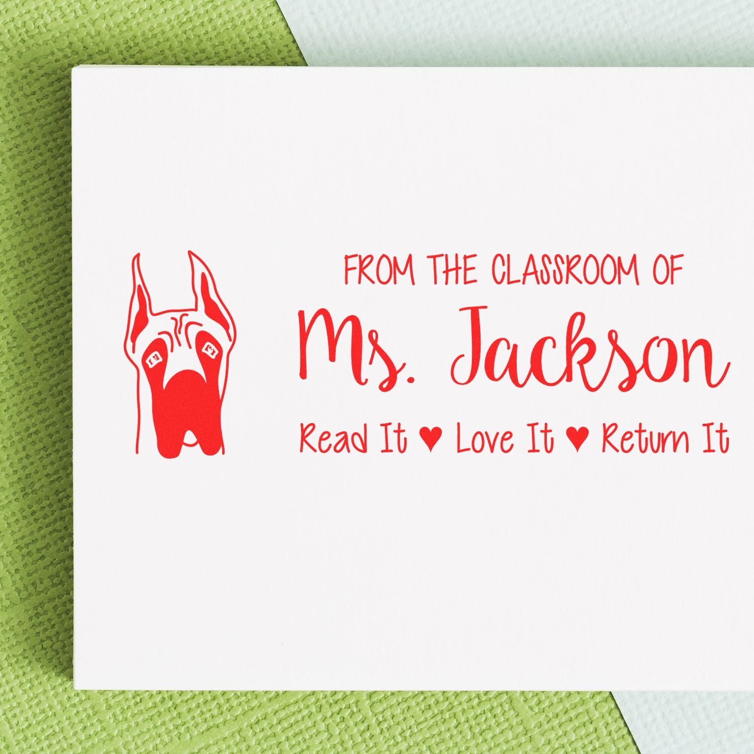 Custom teacher rubber stamp with dog graphic, personalized classroom book stamp for Ms. Jackson: Read It, Love It, Return It.