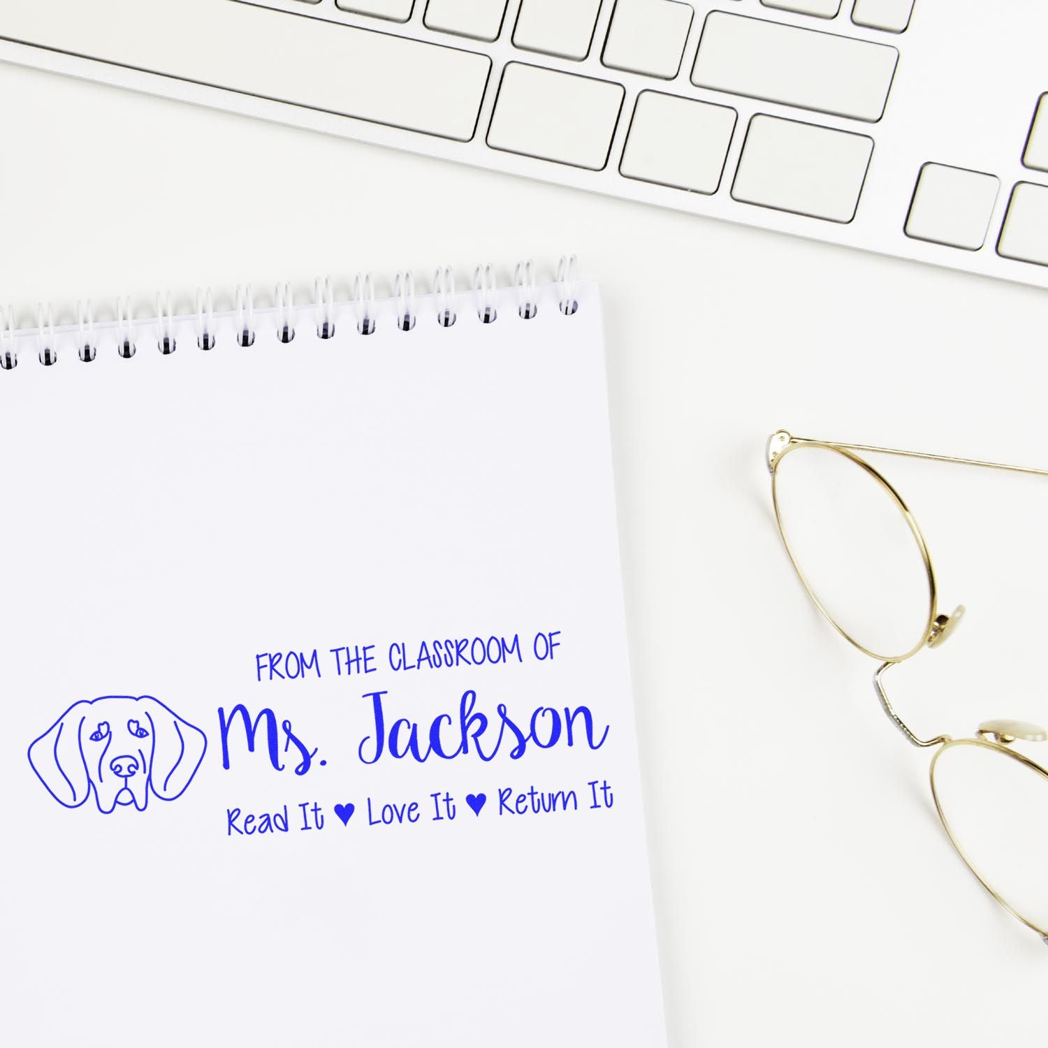 Custom classroom book stamp for teachers, featuring From the classroom of Ms. JacksonRead It, Love It, Return It.