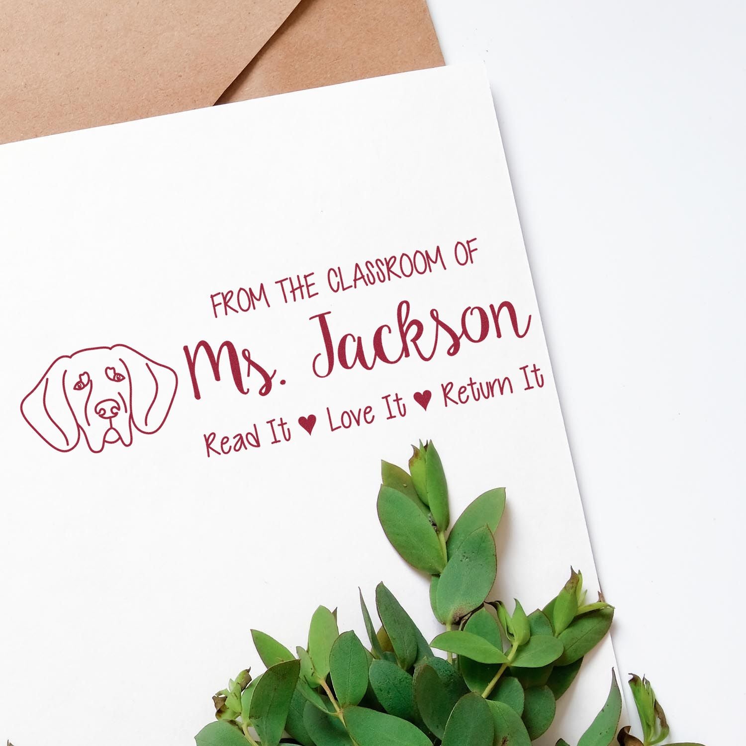 Personalized teacher rubber stamp reading From the Classroom of Ms. Jackson with dog icon and read, love, return message.