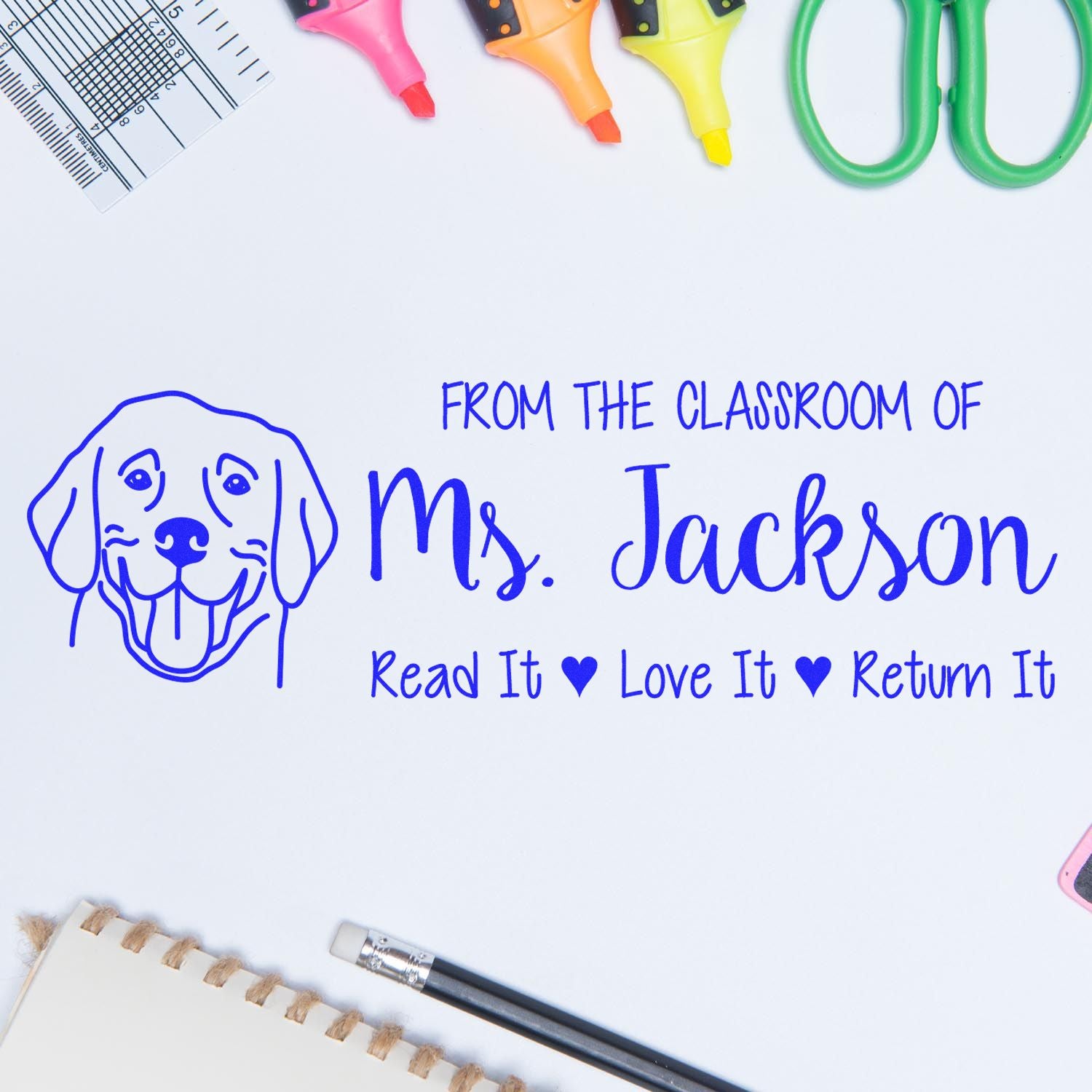 Personalized classroom rubber stamp for Ms. Jackson with dog icon and Read It, Love It, Return It book label.
