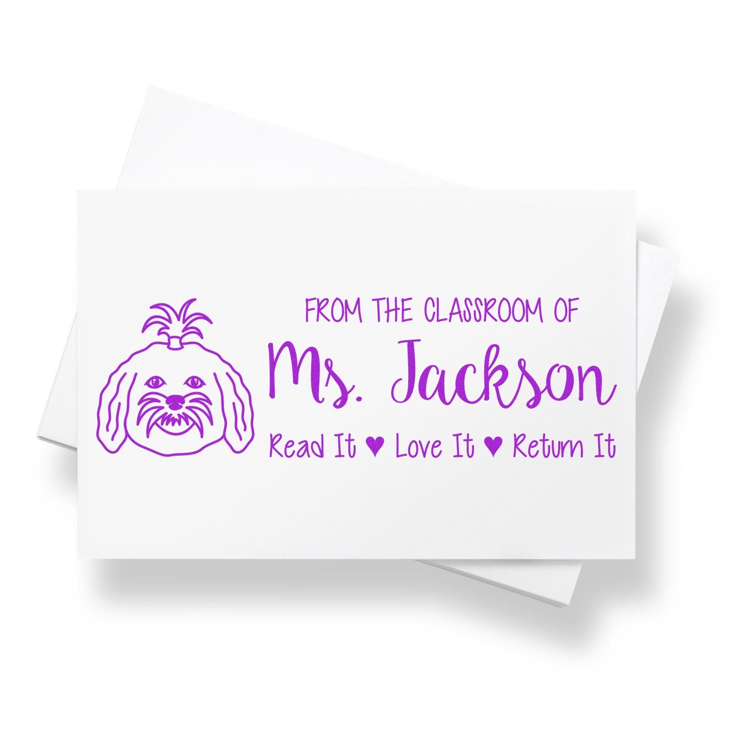 Custom rubber stamp for teacher library books, Ms. Jackson design with dog and Read It, Love It, Return It classroom message.