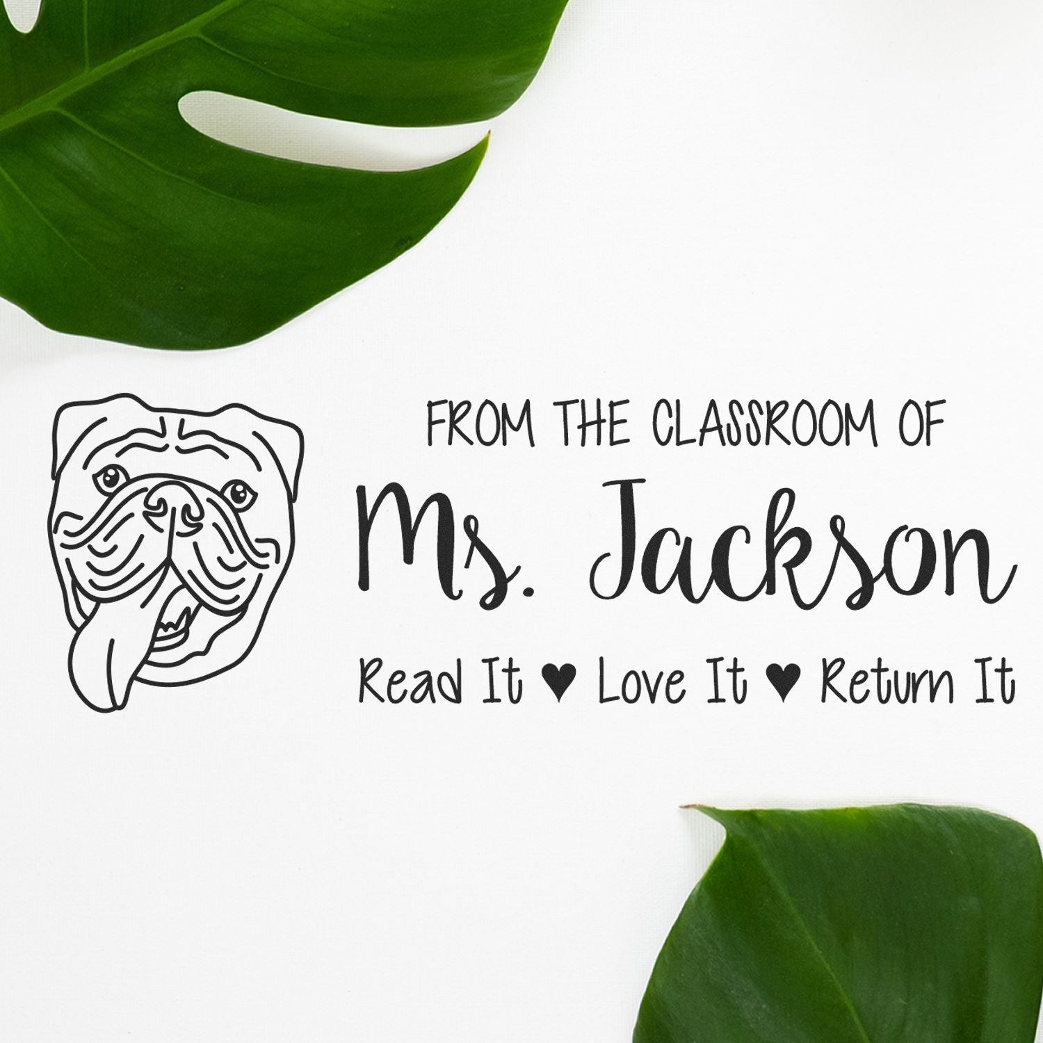 Personalized teacher rubber stamp with bulldog design and Read It, Love It, Return It book label for Ms. Jacksons classroom.
