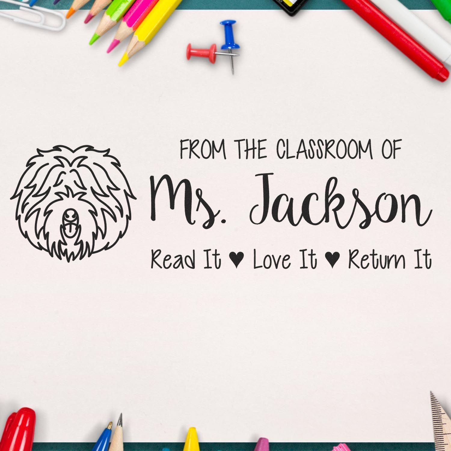 Custom teacher rubber stamp for Ms. Jackson book labels, reading Read It, Love It, Return It with dog logo.