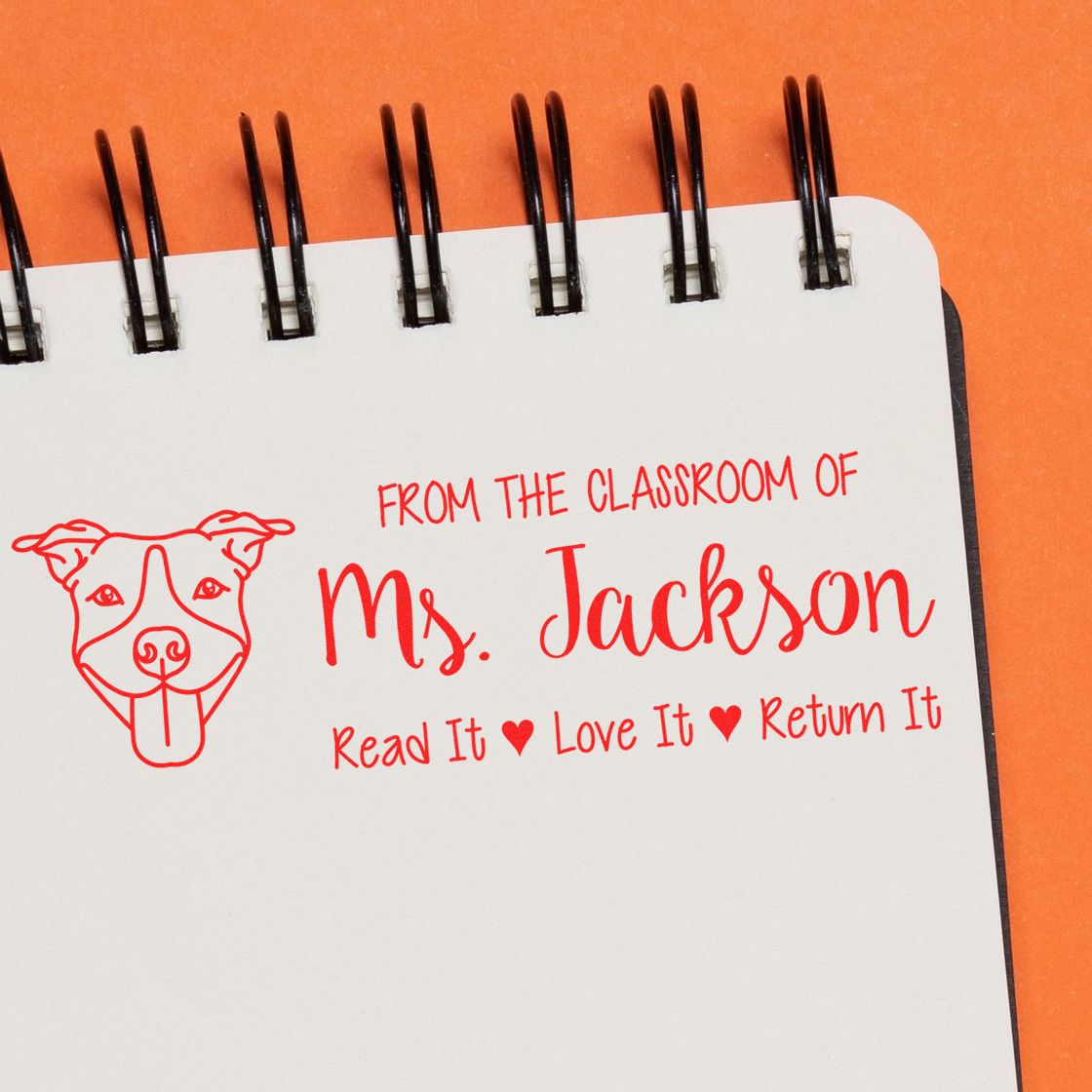 Custom teacher rubber stamp for Ms. Jackson with dog icon and Read It, Love It, Return It classroom message.