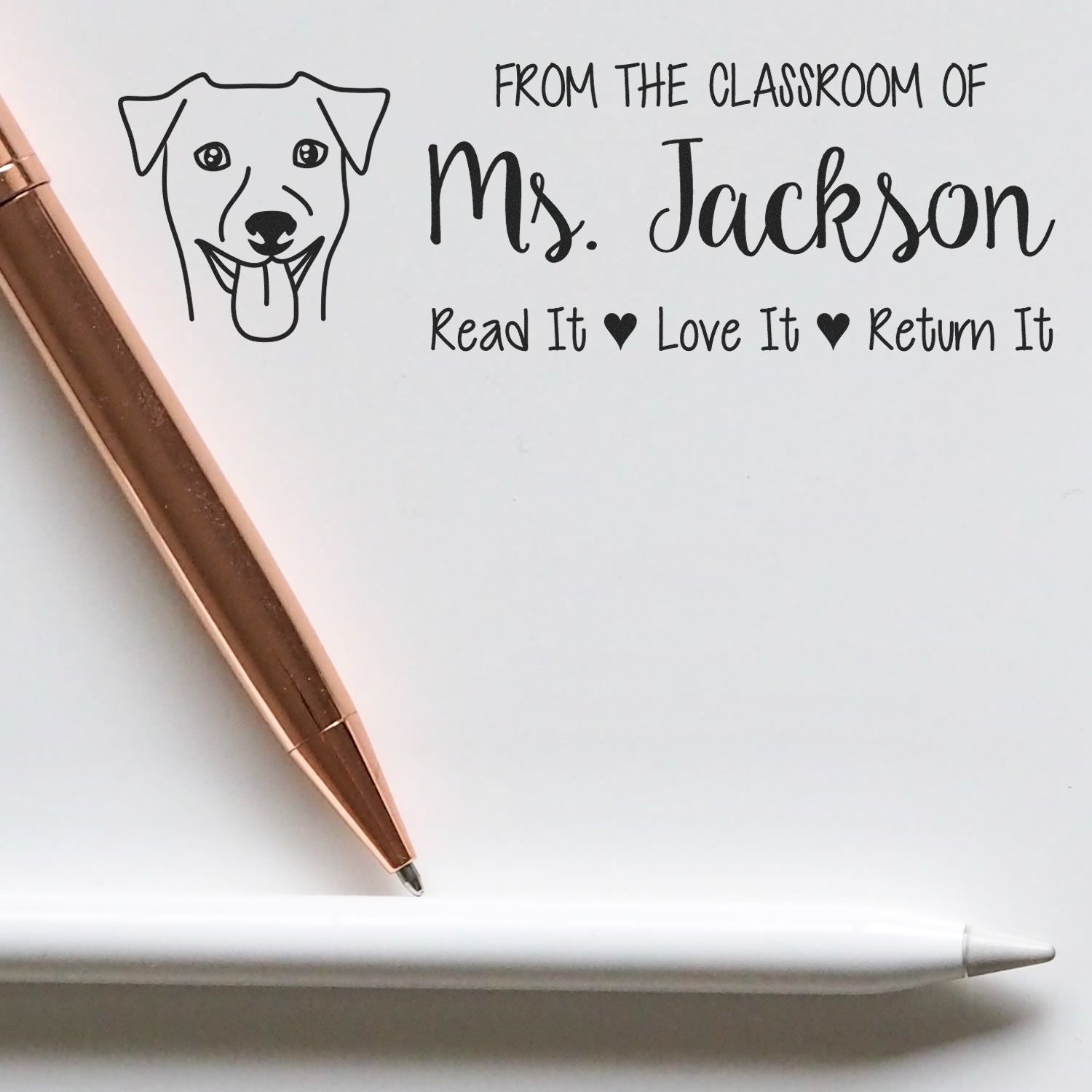Custom classroom book rubber stamp for Ms. Jackson with dog icon and Read It, Love It, Return It library message.
