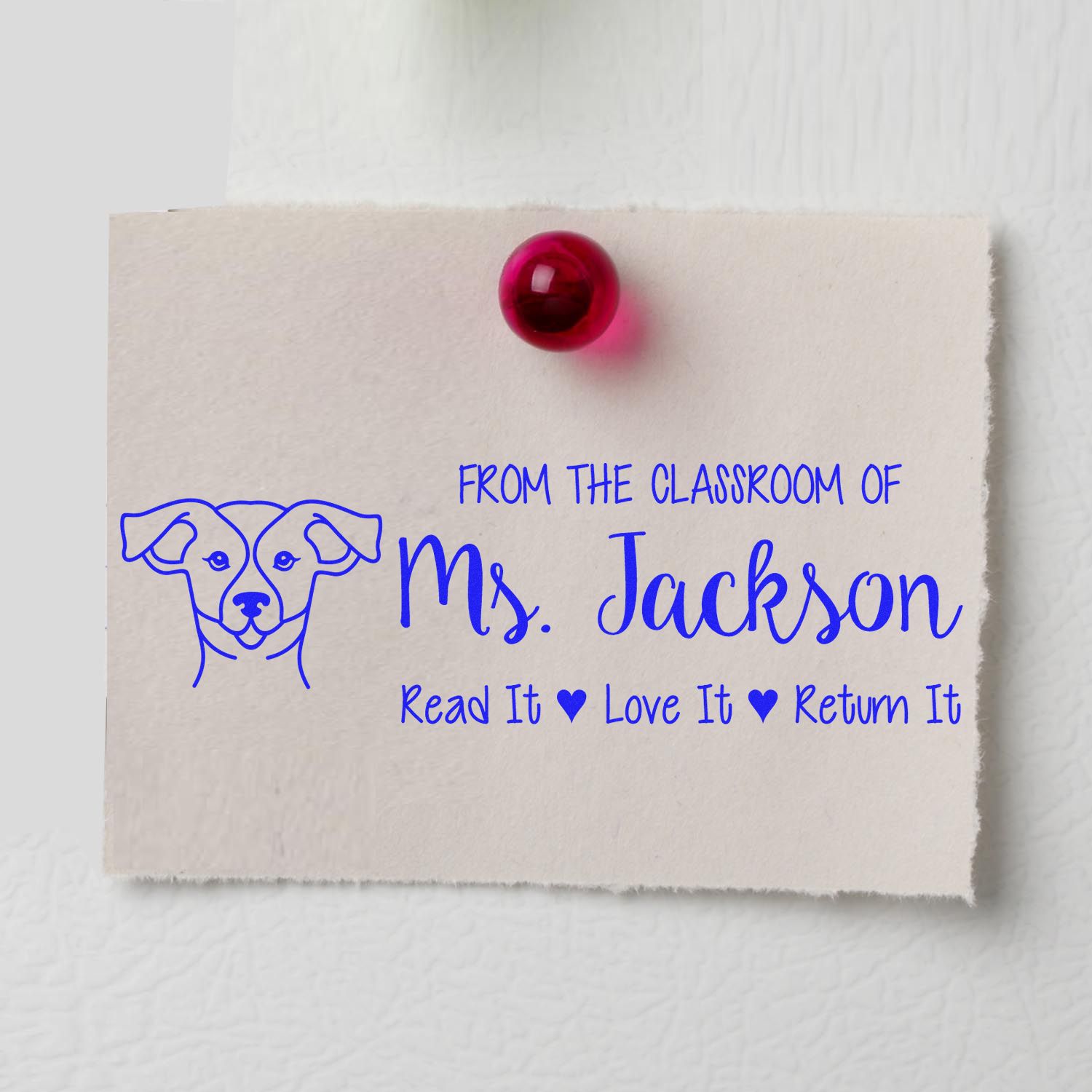 Personalized teacher rubber stamp with dog design and From the Classroom of Ms. Jackson book return message.