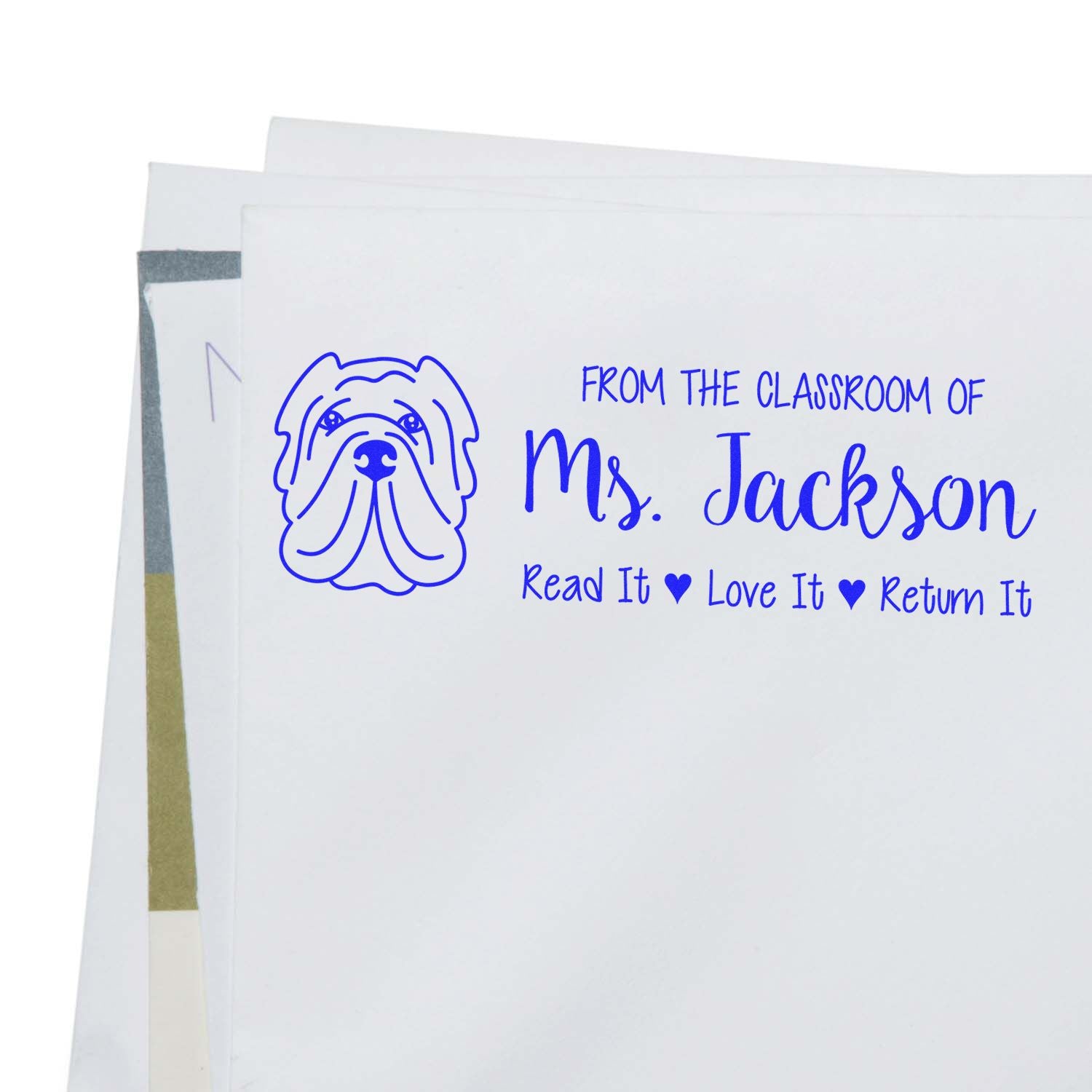 Personalized classroom library rubber stamp for Ms. Jackson with dog icon and Read It, Love It, Return It message.