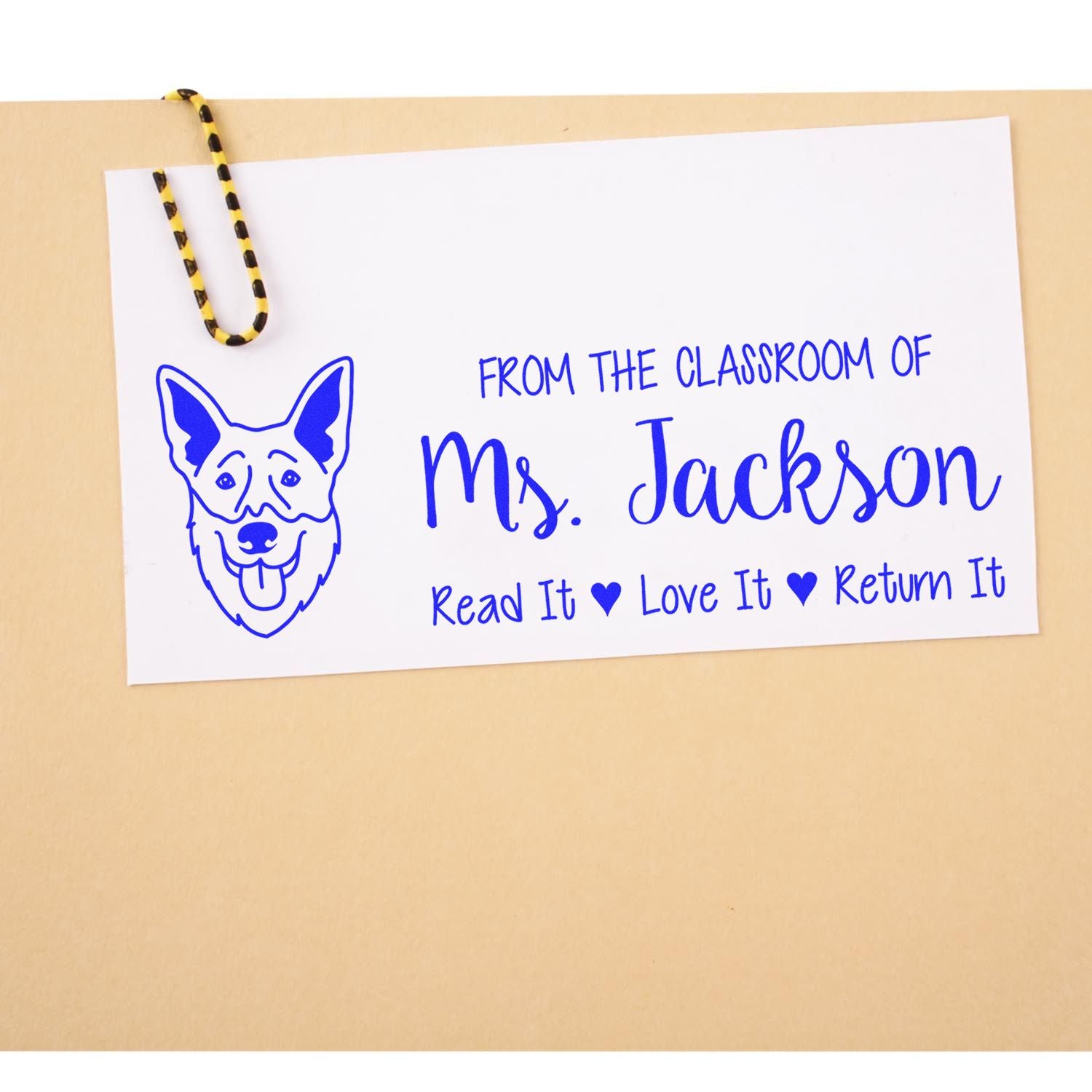 Personalized teacher rubber stamp for Ms. Jackson with dog icon and Read It, Love It, Return It book return message.