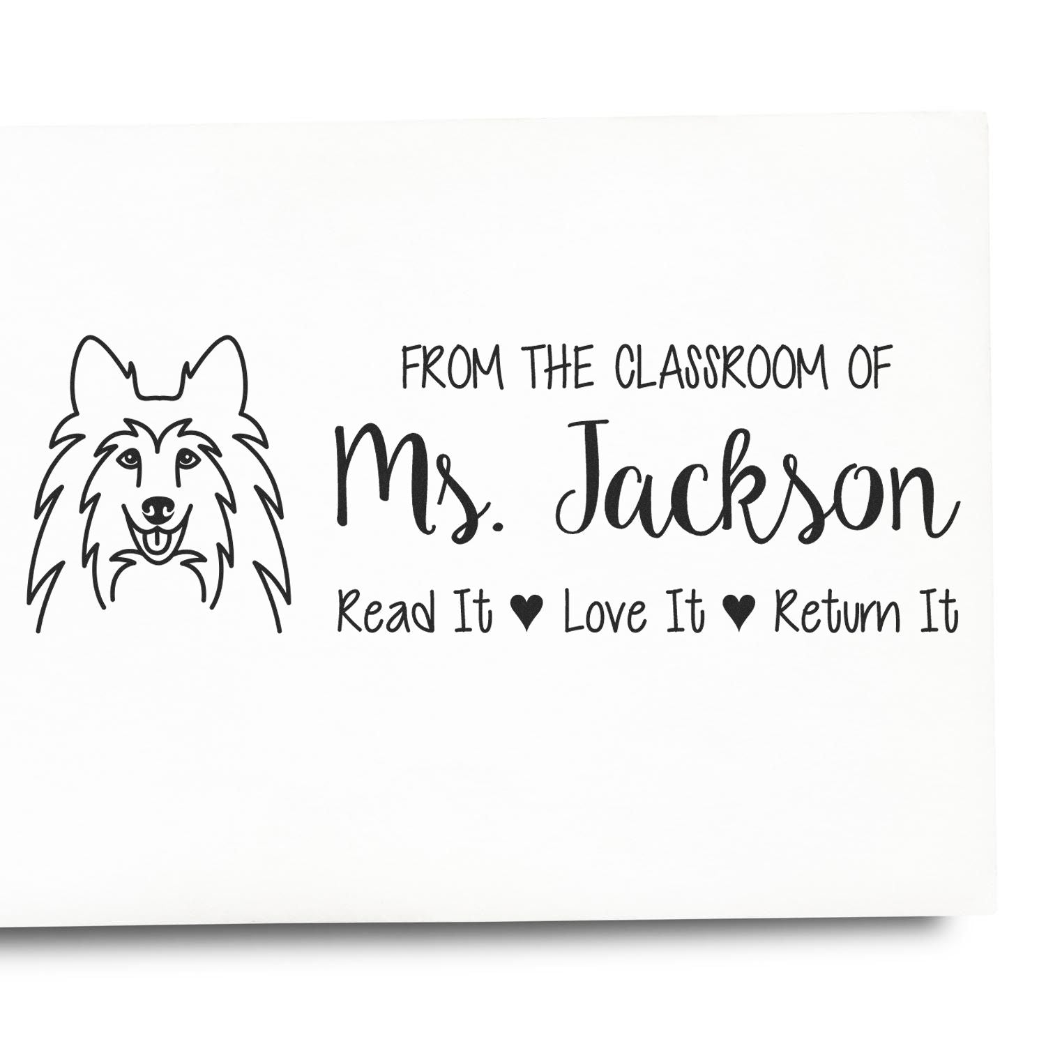 Personalized classroom rubber stamp with dog graphic, Ms. Jackson name, and Read It, Love It, Return It book reminder.