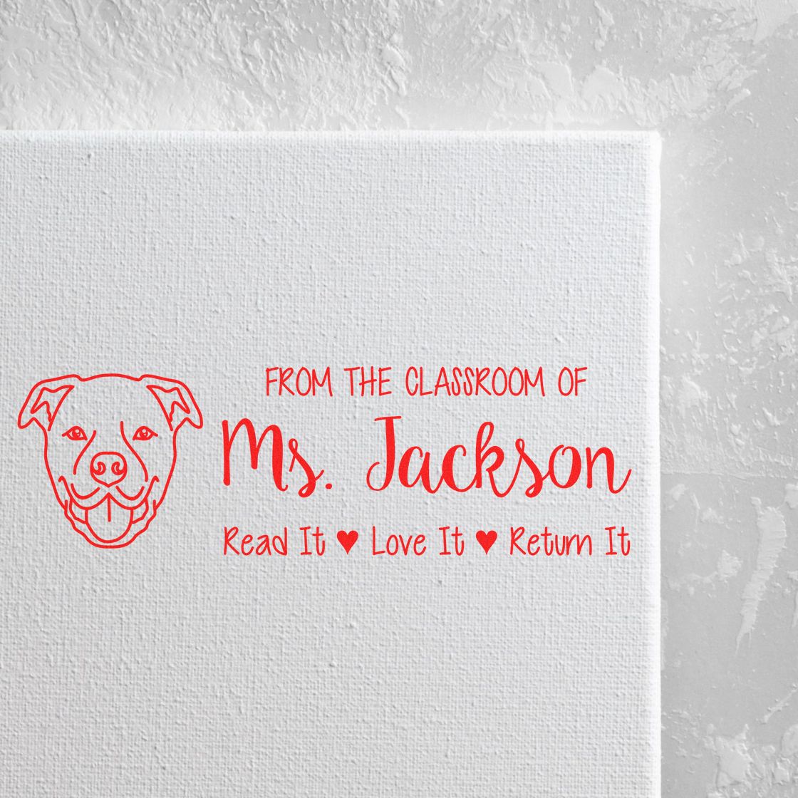 Personalized teacher rubber stamp for Ms. Jackson with dog design and Read It, Love It, Return It classroom book message.