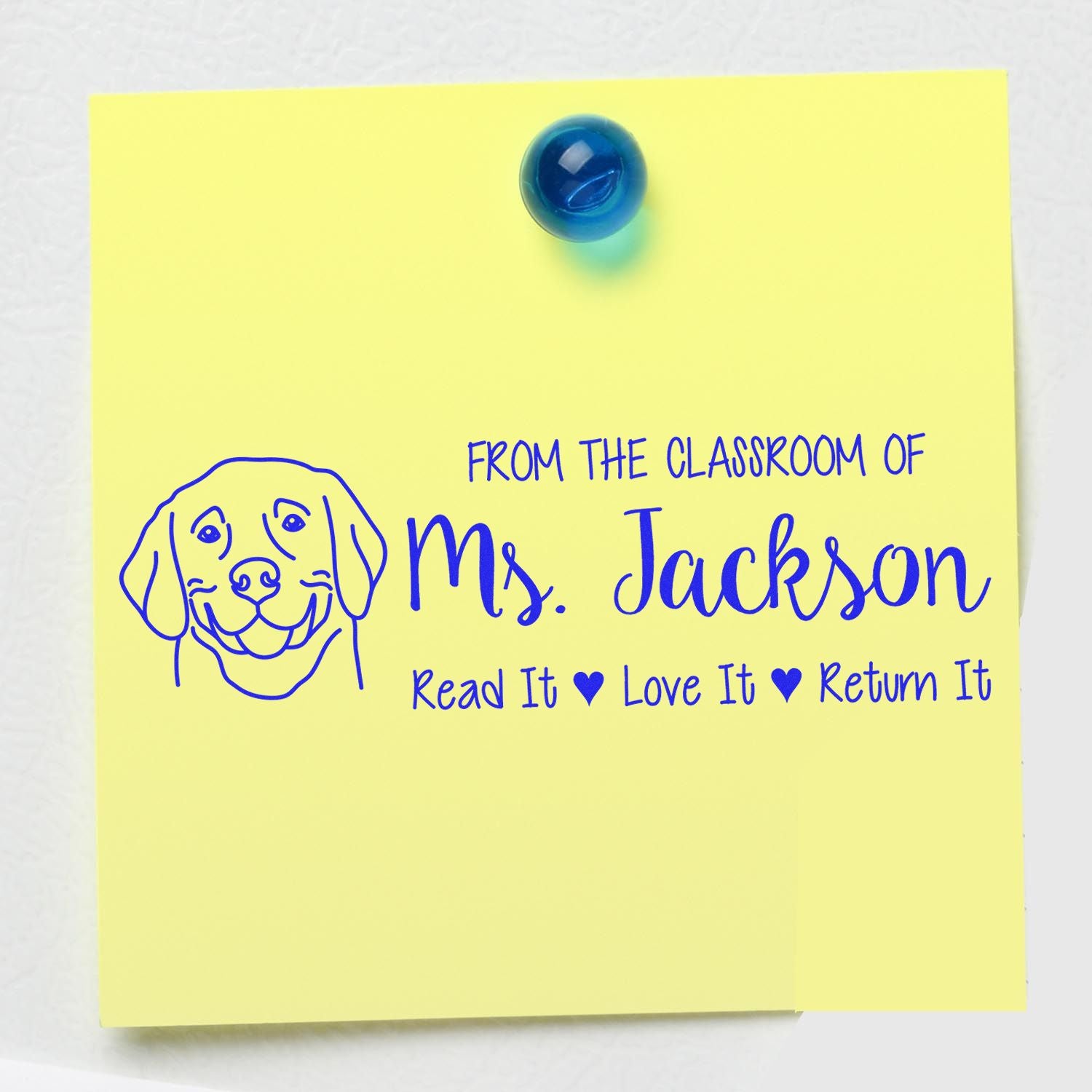 Personalized rubber stamp for Ms. Jacksons classroom with dog icon and Read It, Love It, Return It book label.