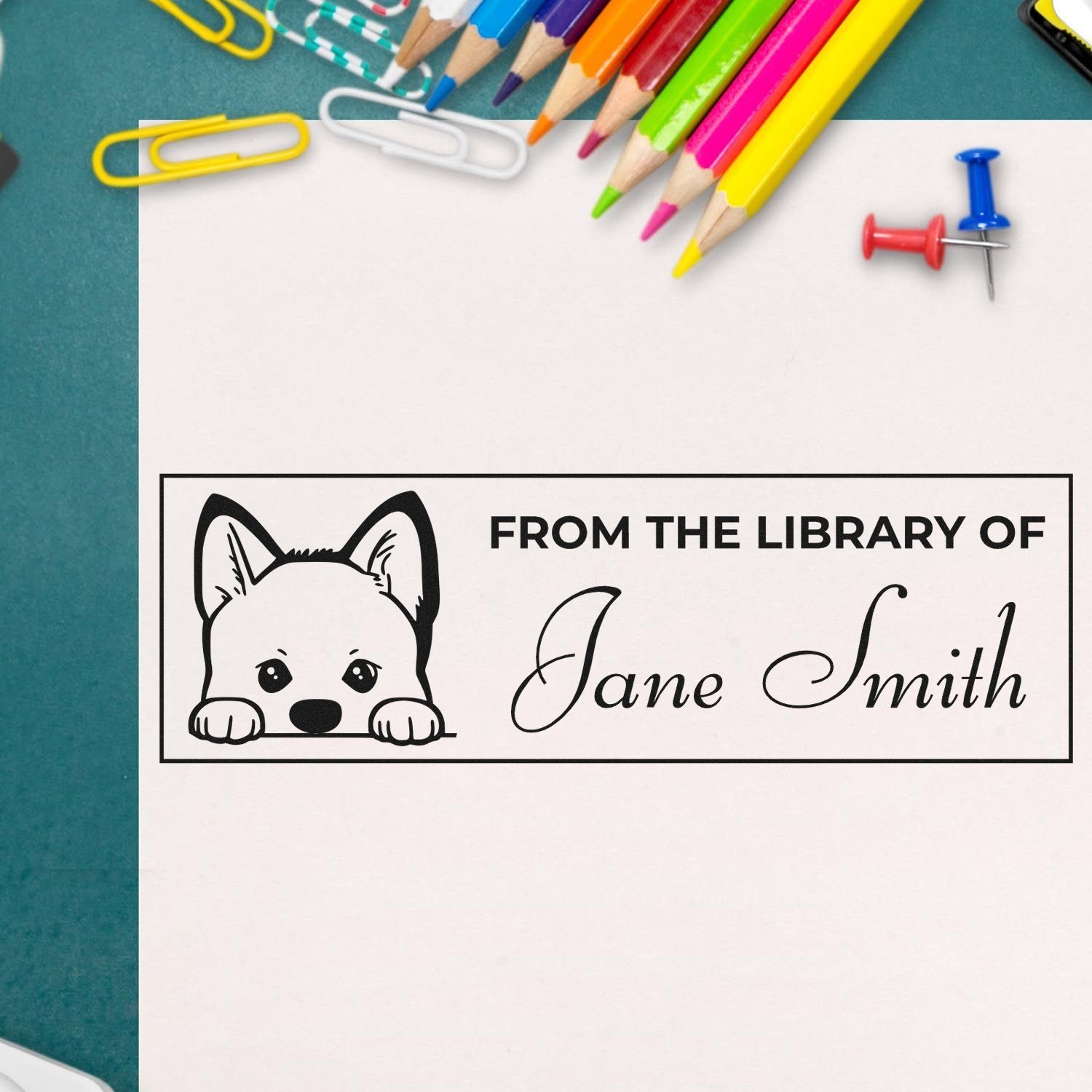 Custom personalized library rubber stamp with dog design and Jane Smith name, perfect for bookplates and stationery.