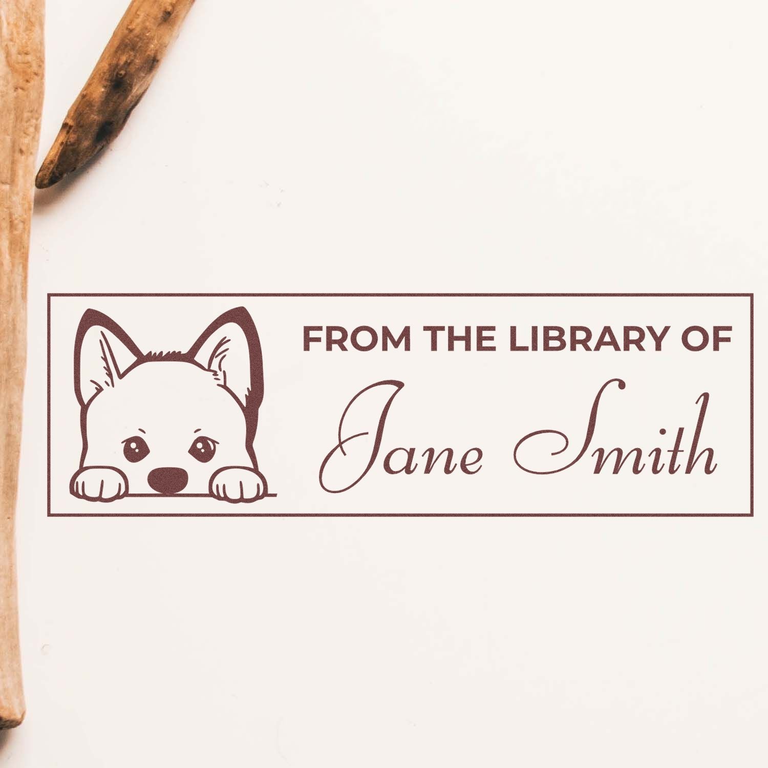 Personalized book stamp with dog illustration and From the Library of Jane Smith text for custom library books.