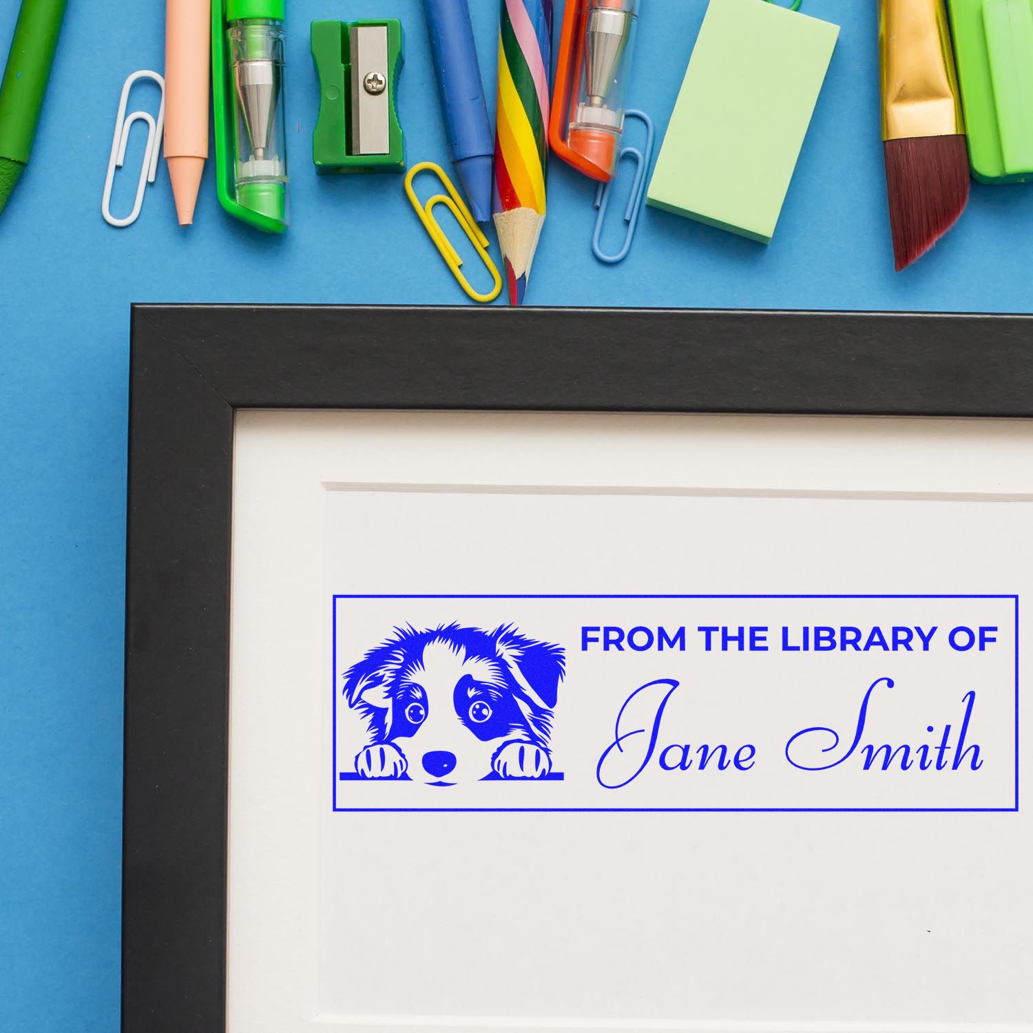 Custom rubber stamp bookplate with dog design and From the Library of Jane Smith for personalized book marking.