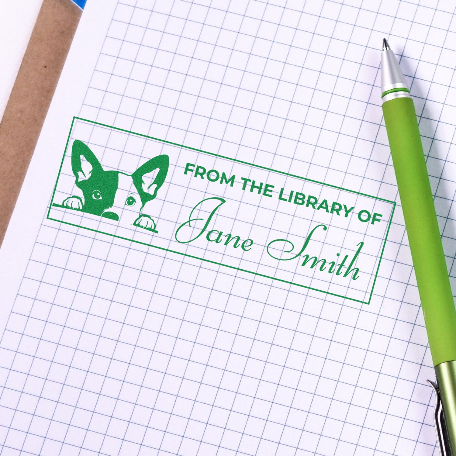 Custom rubber stamp reading From the Library of Jane Smith with dog design for personalized book and library marking.