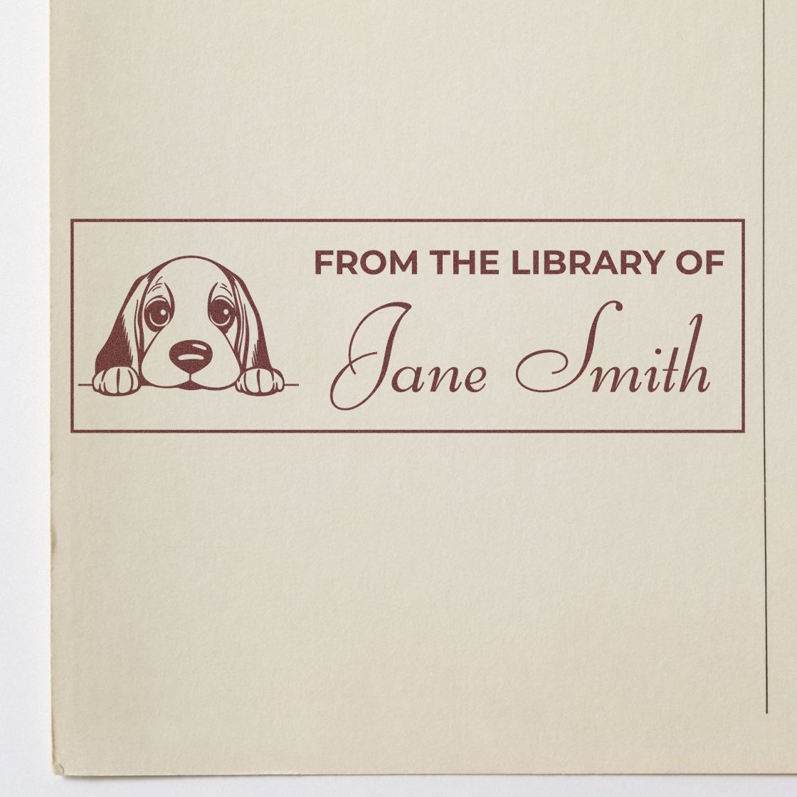 Custom dog library stamp reading From the Library of Jane Smith for personalized books and bookplate collections.