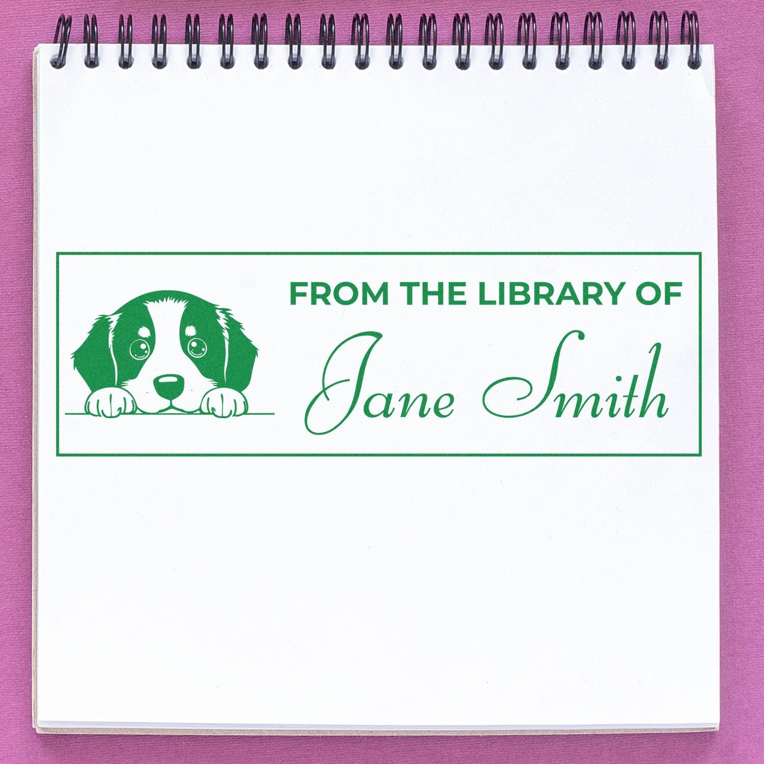Custom rubber library stamp with dog design reading From the Library of Jane Smith for books, journals, and notebooks.
