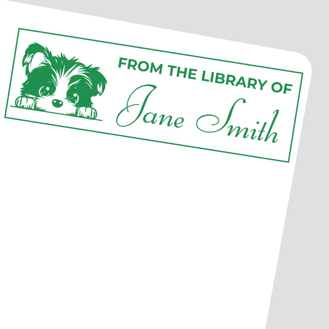 Custom From the Library of Jane Smith rubber stamp with puppy design for personalized book labeling.
