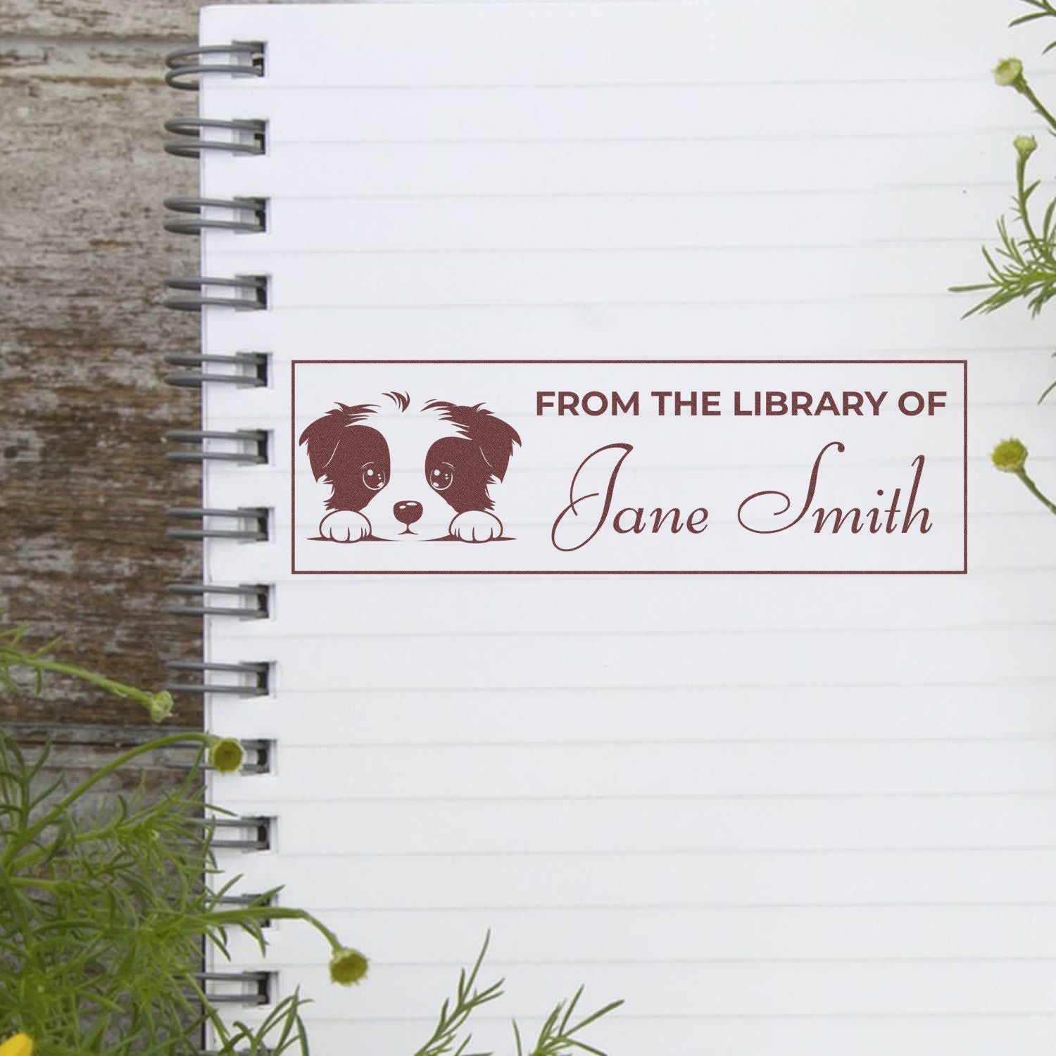 Personalized rubber stamp bookplate with dog design reading From the Library of Jane Smith