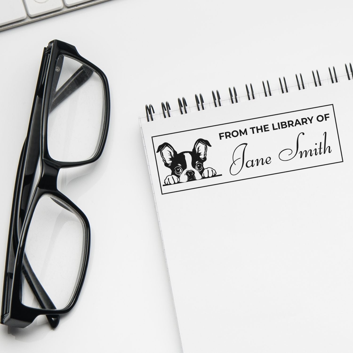Personalized rubber stamp for books with From the Library of Jane Smith and dog design for custom bookplates.