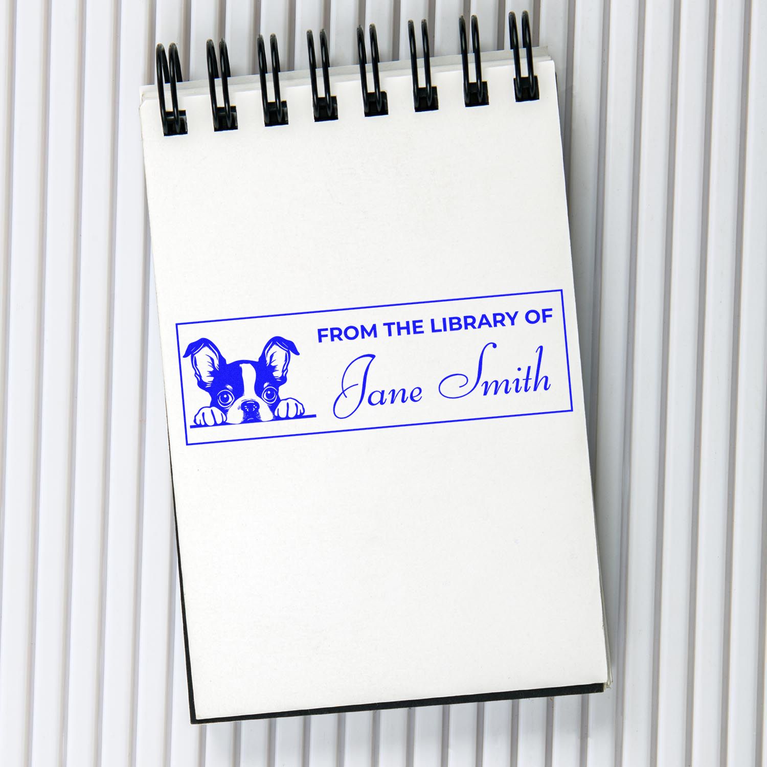 Personalized library rubber stamp with dog design and Jane Smith name for custom bookplates and book ownership.